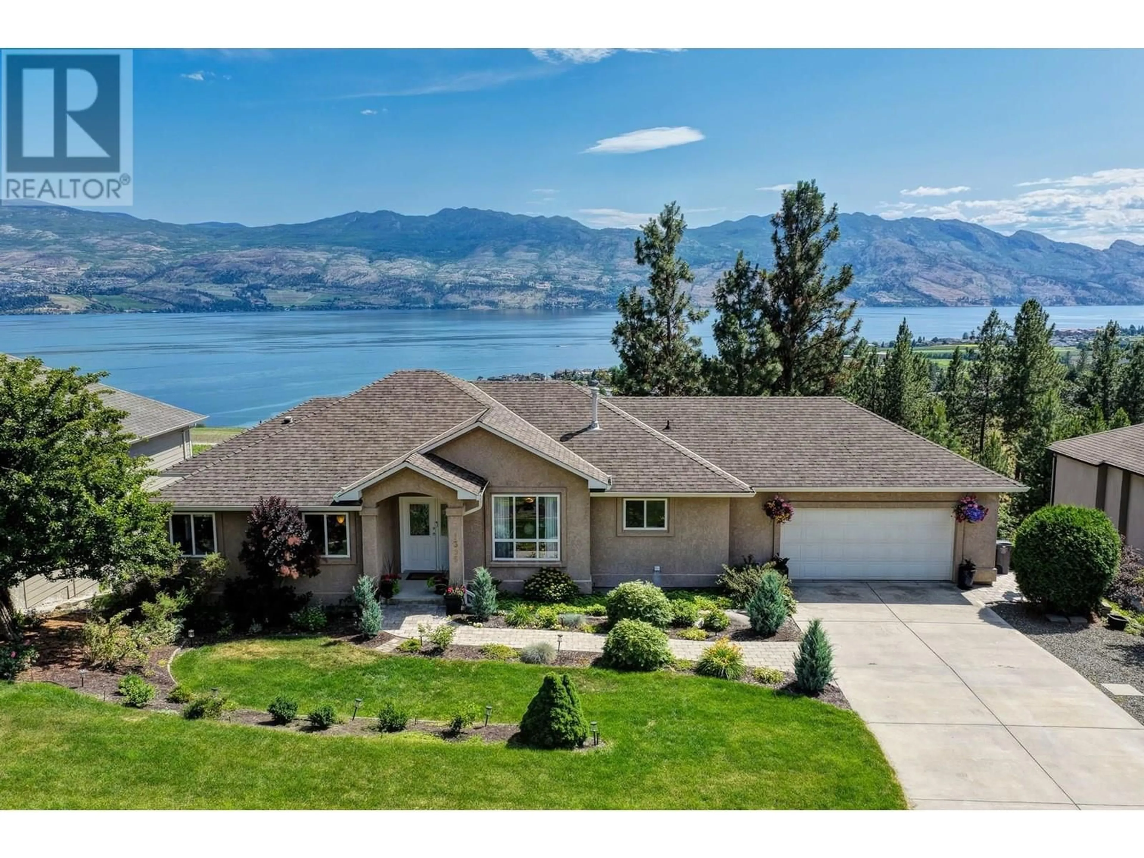 A pic from outside/outdoor area/front of a property/back of a property/a pic from drone, water/lake/river/ocean view for 1395 GREGORY ROAD, West Kelowna British Columbia V1Z3P2
