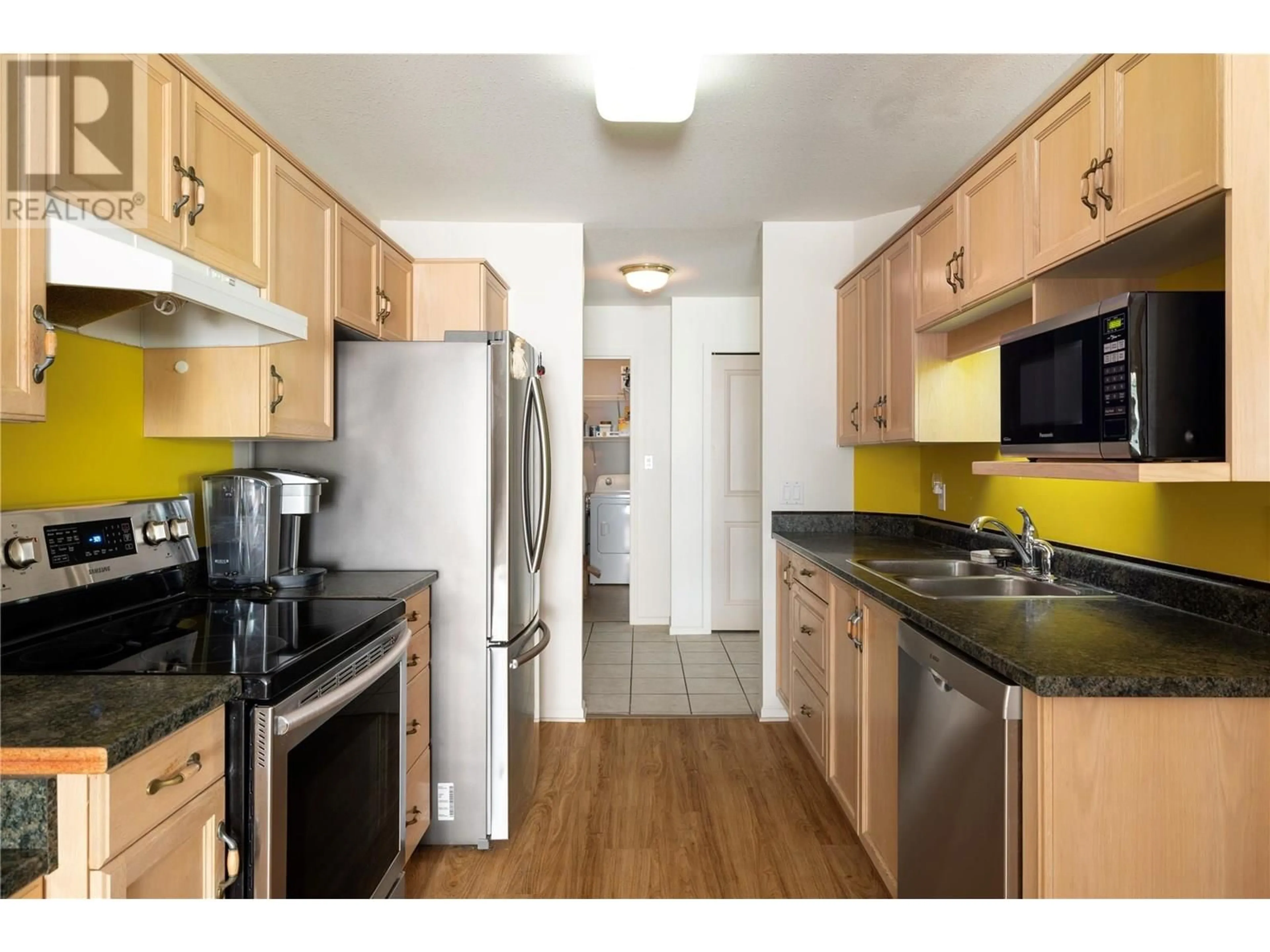 Standard kitchen, wood/laminate floor for 202 - 3858 BROWN ROAD, West Kelowna British Columbia V4T2J5