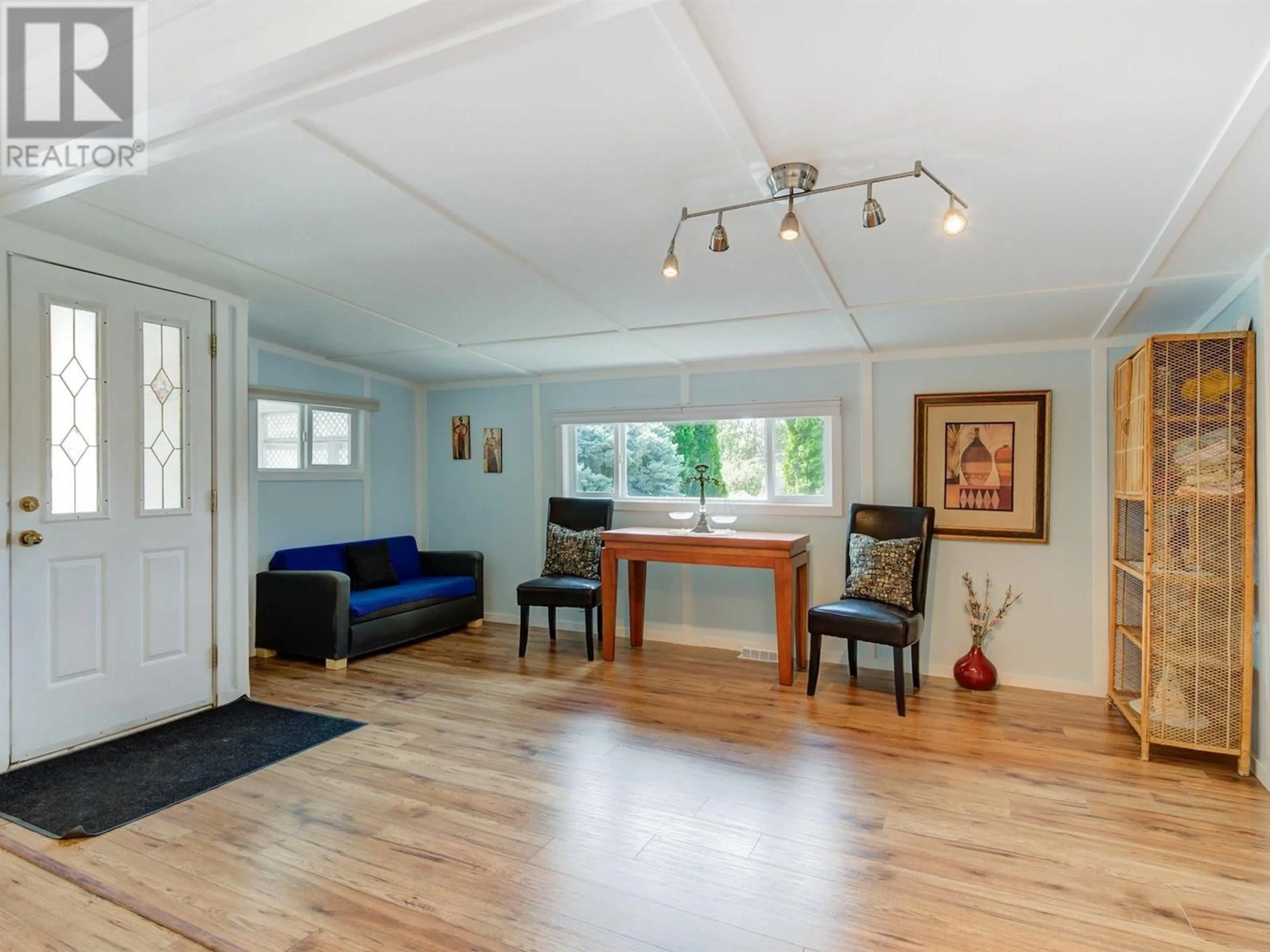 Living room with furniture, wood/laminate floor for 20 - 3206 SHANNON LAKE ROAD, West Kelowna British Columbia V4T1V4