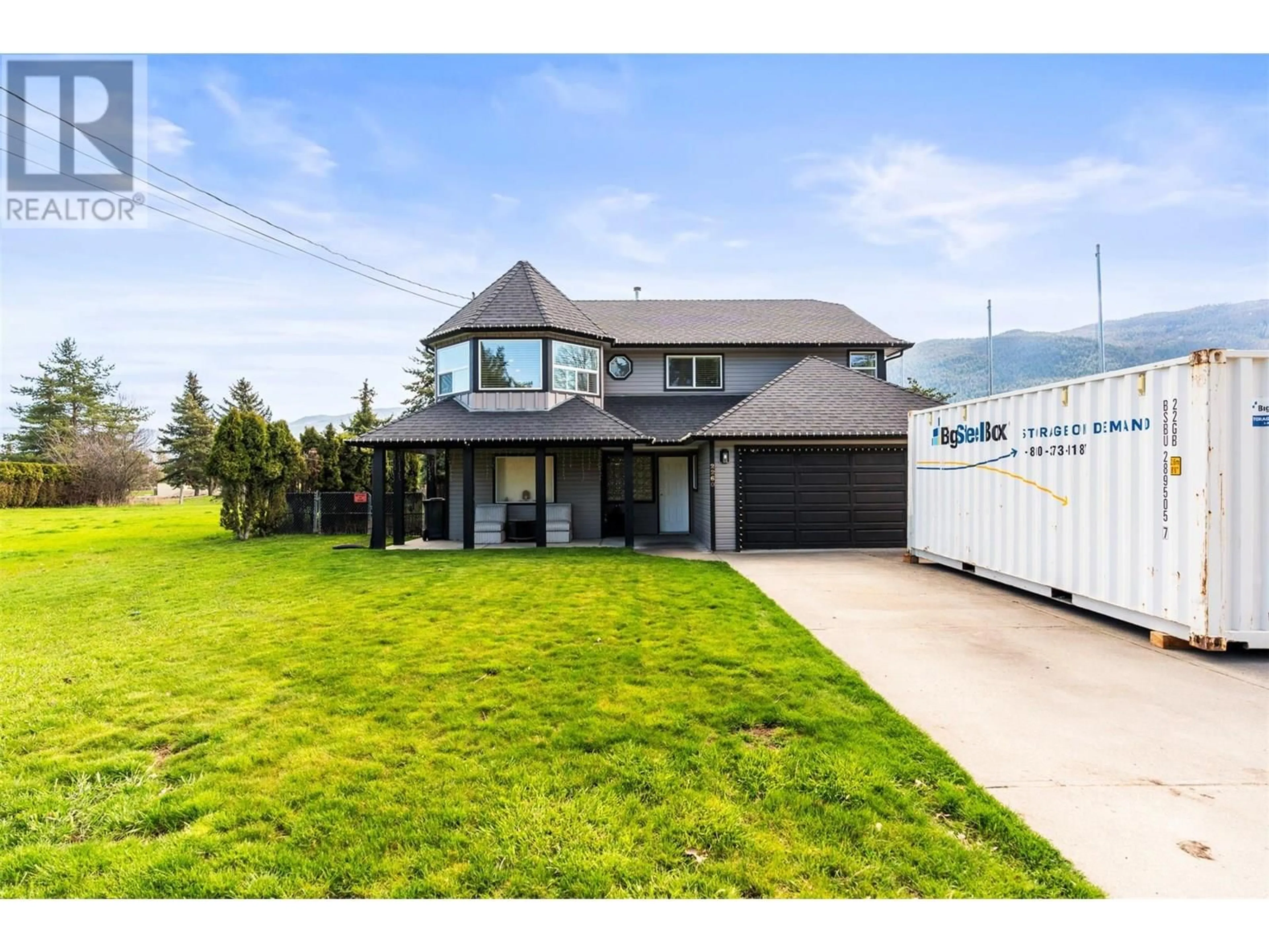 Home with vinyl exterior material, street for 2260 OKANAGAN STREET, Armstrong British Columbia V4Y0B7