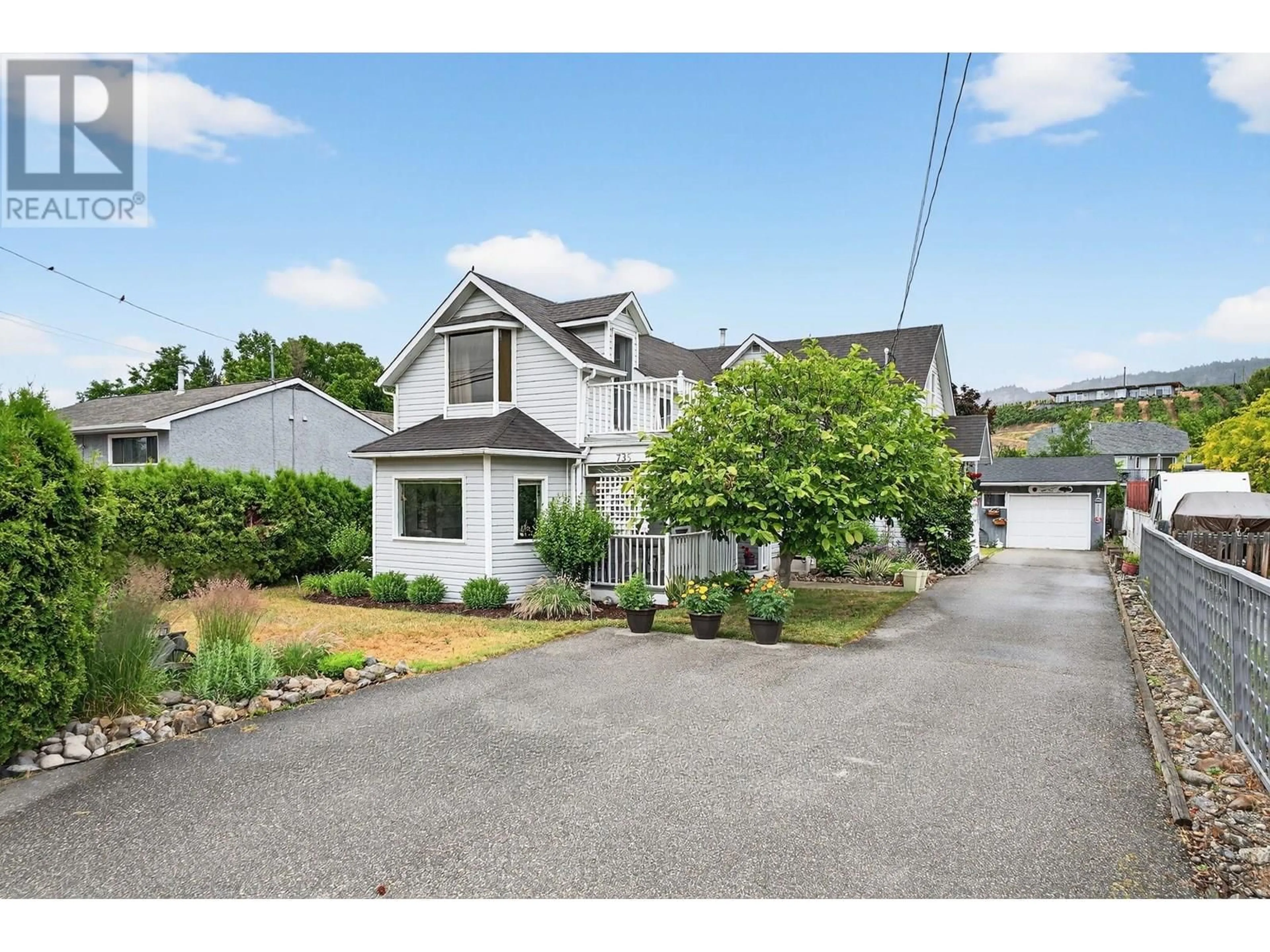A pic from outside/outdoor area/front of a property/back of a property/a pic from drone, street for 735 ROBINSON AVENUE, Naramata British Columbia V0H1N0