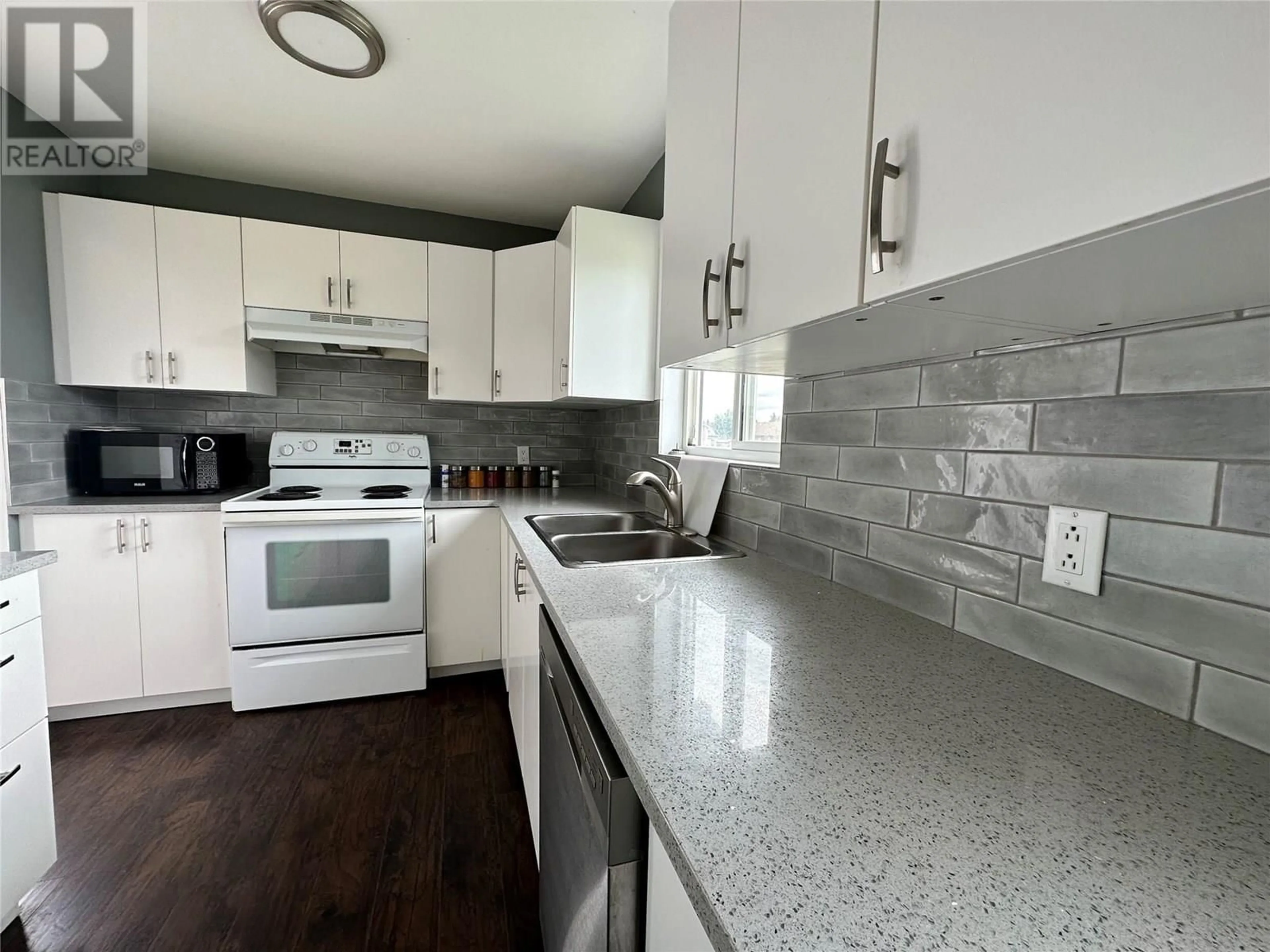 Open concept kitchen, ceramic/tile floor for 1112 96A AVENUE, Dawson Creek British Columbia V1G1M8