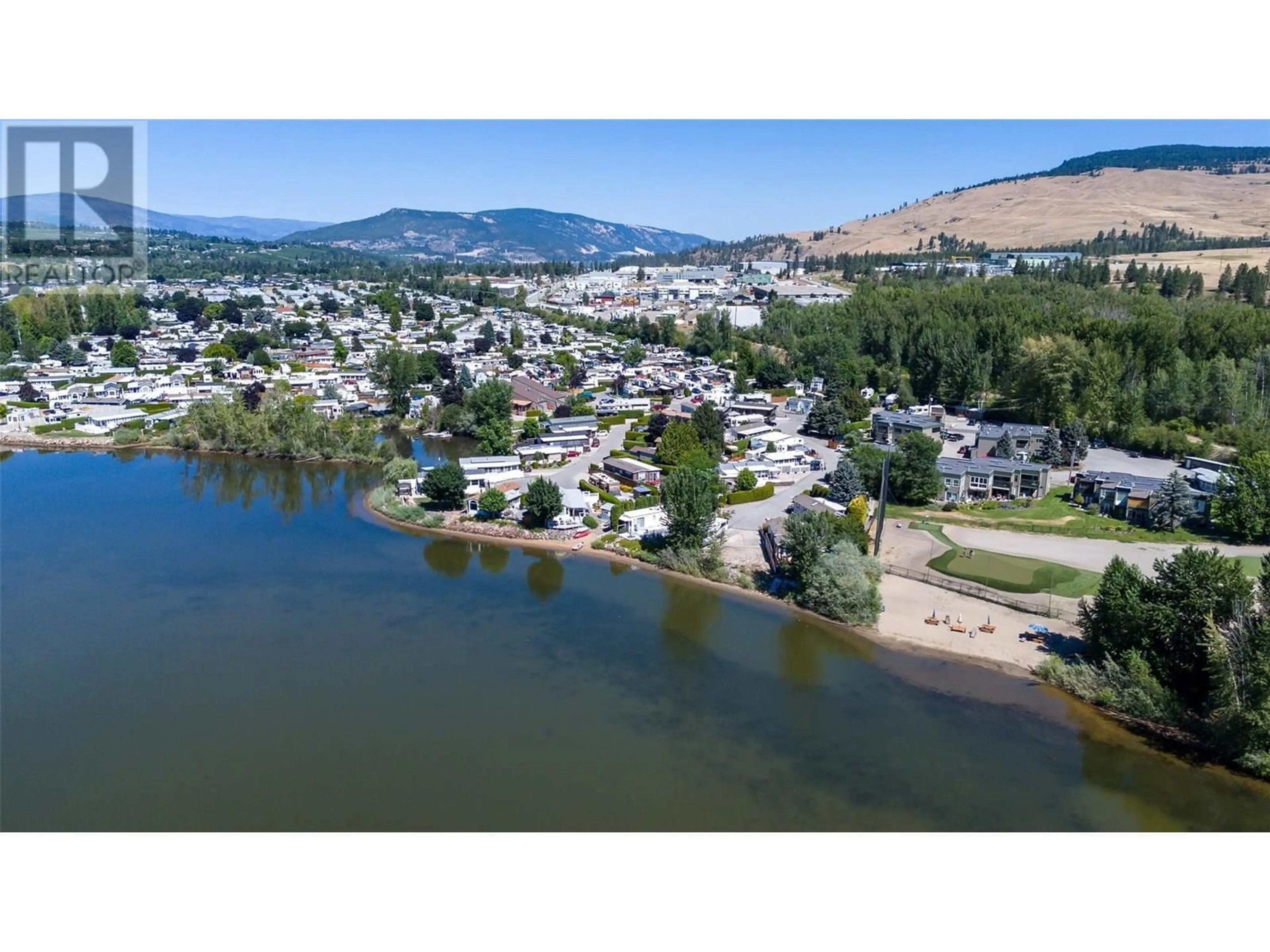 A pic from outside/outdoor area/front of a property/back of a property/a pic from drone, water/lake/river/ocean view for 3206 - 415 COMMONWEALTH ROAD, Kelowna British Columbia V4V2M4