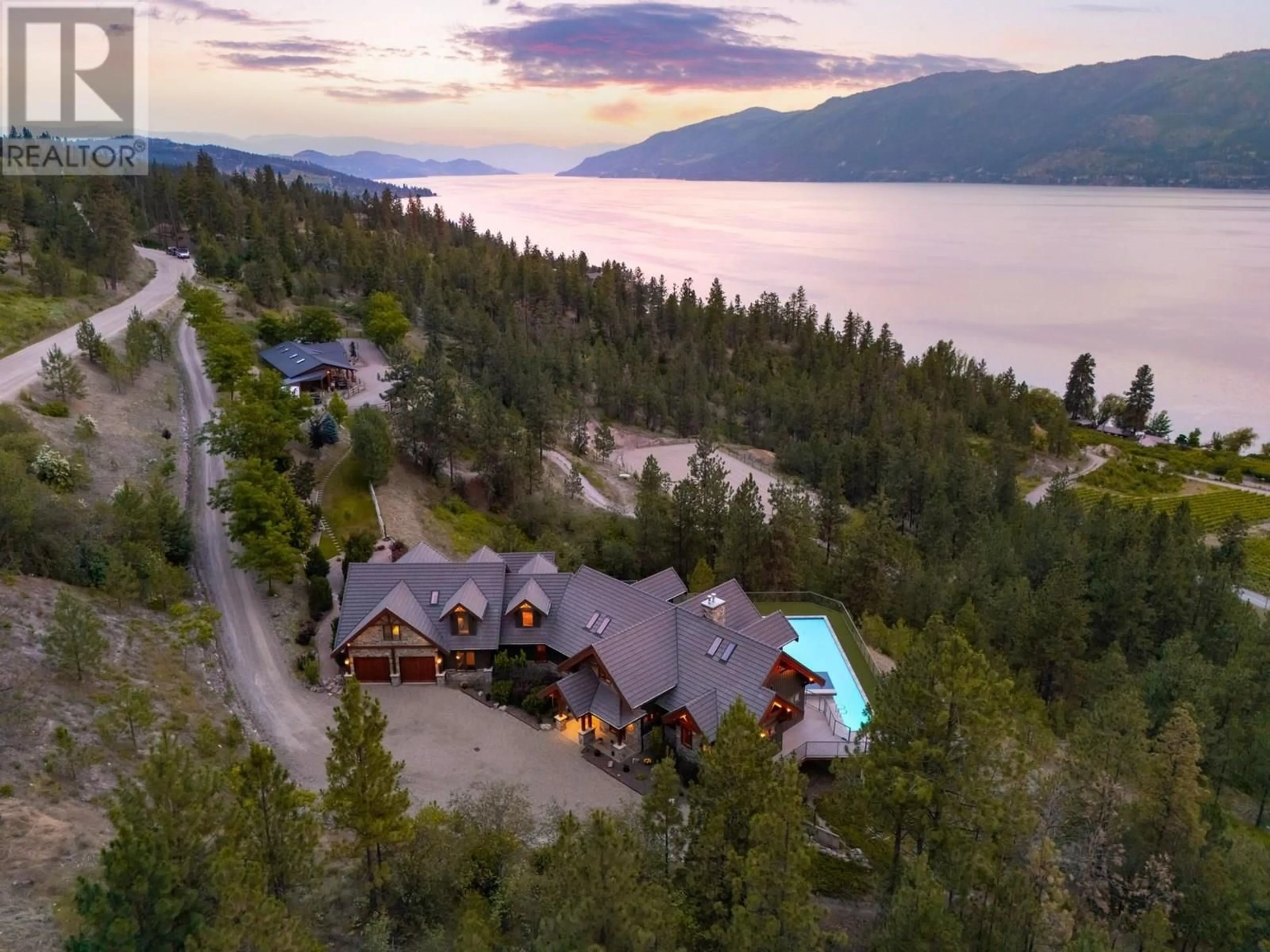 A pic from outside/outdoor area/front of a property/back of a property/a pic from drone, water/lake/river/ocean view for 14162 BARKLEY ROAD, Lake Country British Columbia V4V1A4