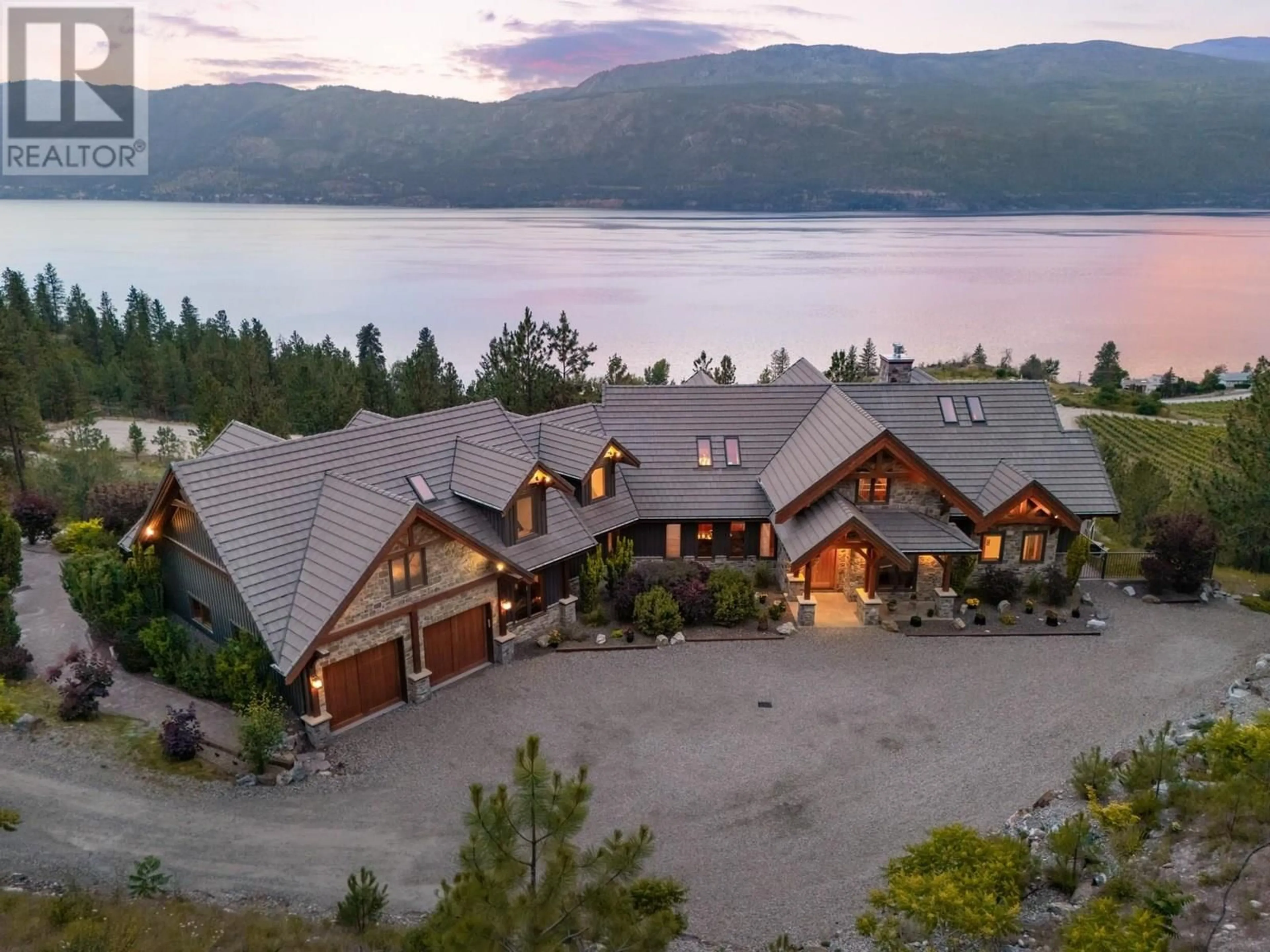 A pic from outside/outdoor area/front of a property/back of a property/a pic from drone, water/lake/river/ocean view for 14162 BARKLEY ROAD, Lake Country British Columbia V4V1A4