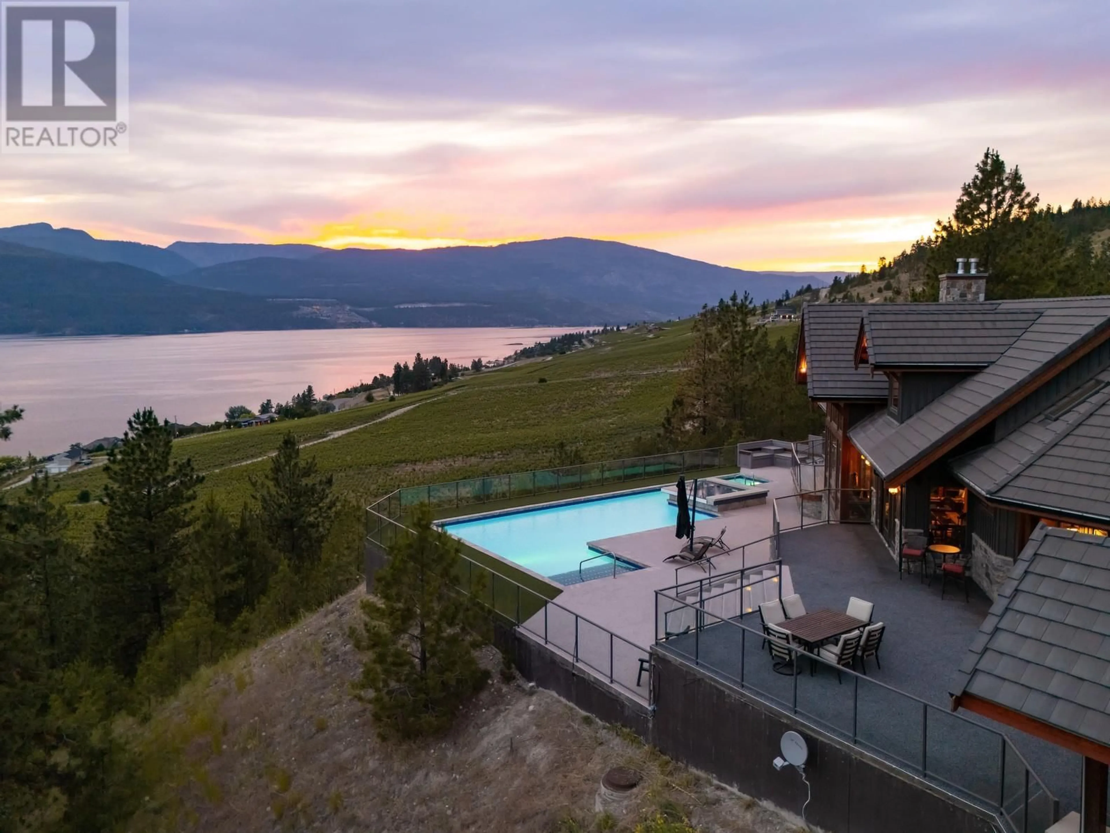 A pic from outside/outdoor area/front of a property/back of a property/a pic from drone, water/lake/river/ocean view for 14162 BARKLEY ROAD, Lake Country British Columbia V4V1A4
