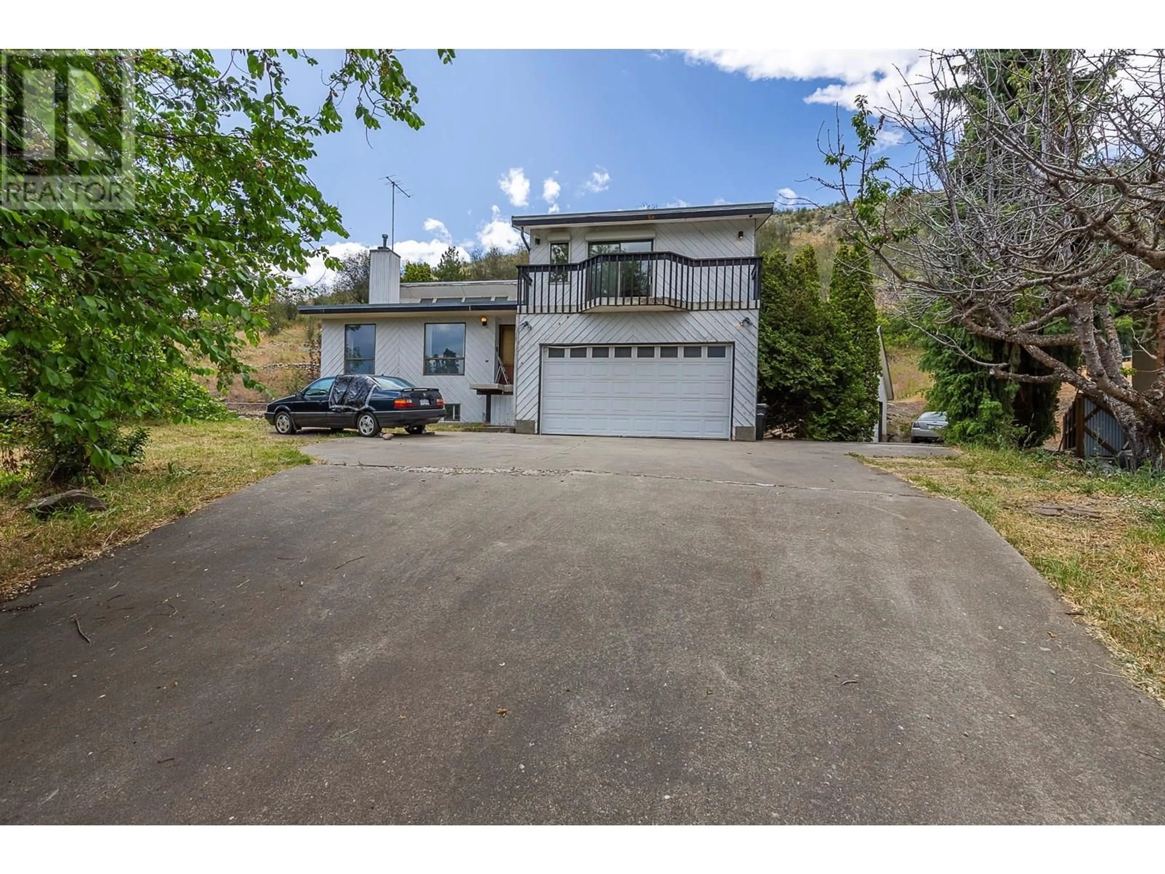 A pic from outside/outdoor area/front of a property/back of a property/a pic from drone, street for 6602 GOOSE LAKE ROAD, Vernon British Columbia V1H1W2