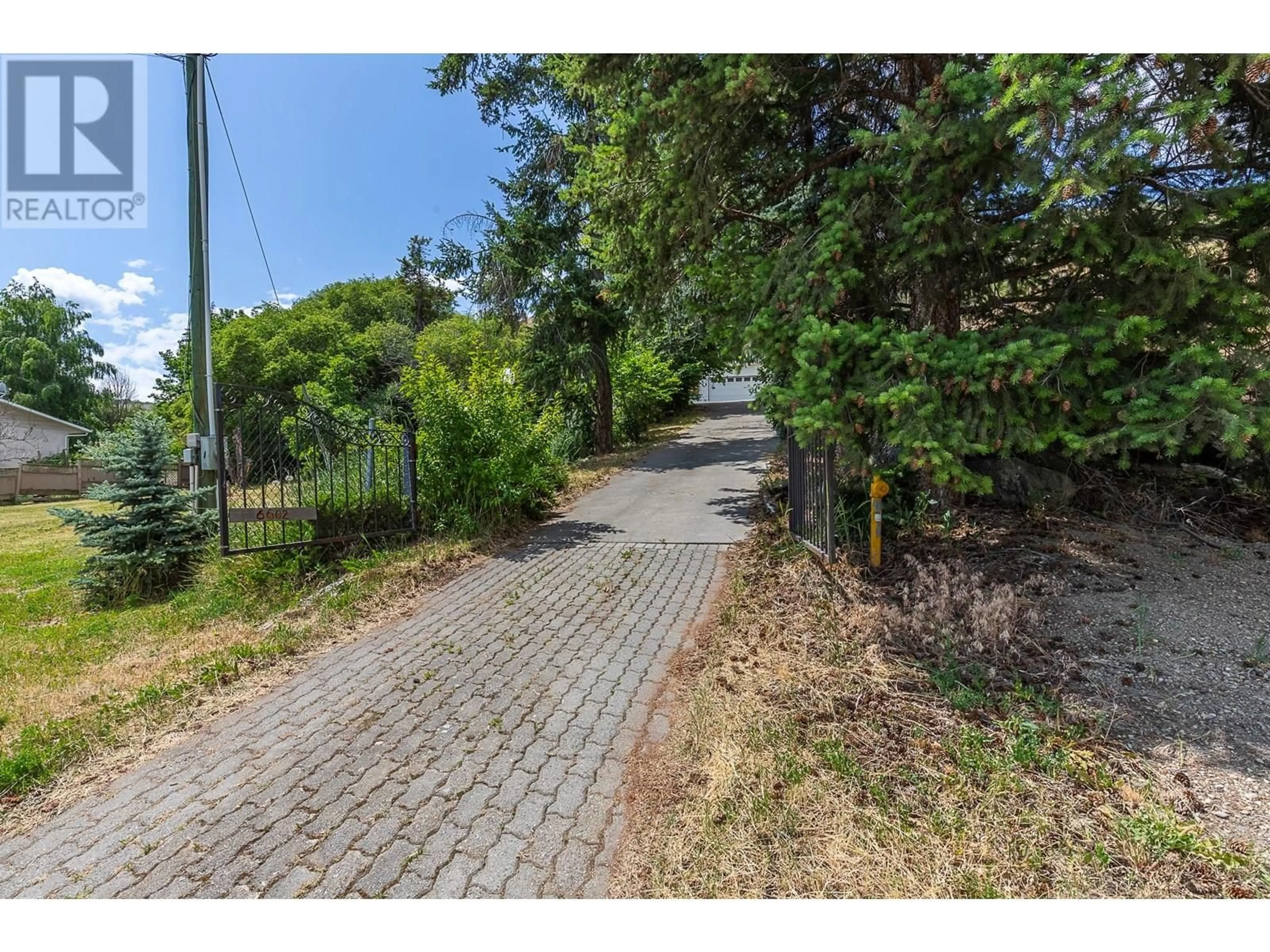 A pic from outside/outdoor area/front of a property/back of a property/a pic from drone, street for 6602 GOOSE LAKE ROAD, Vernon British Columbia V1H1W2