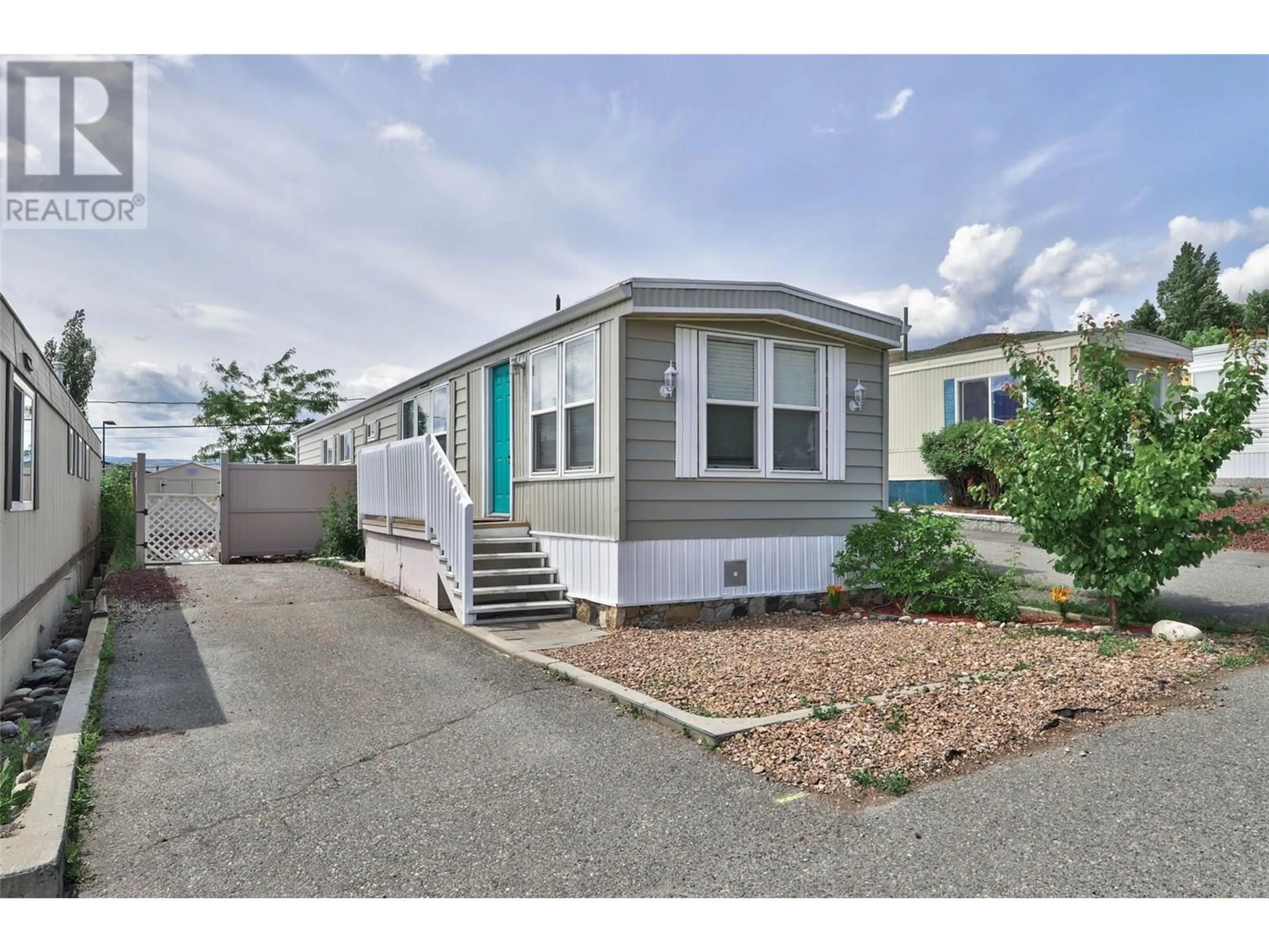 Home with vinyl exterior material, street for 14 - 1440 ORD ROAD, Kamloops British Columbia V2B8P9