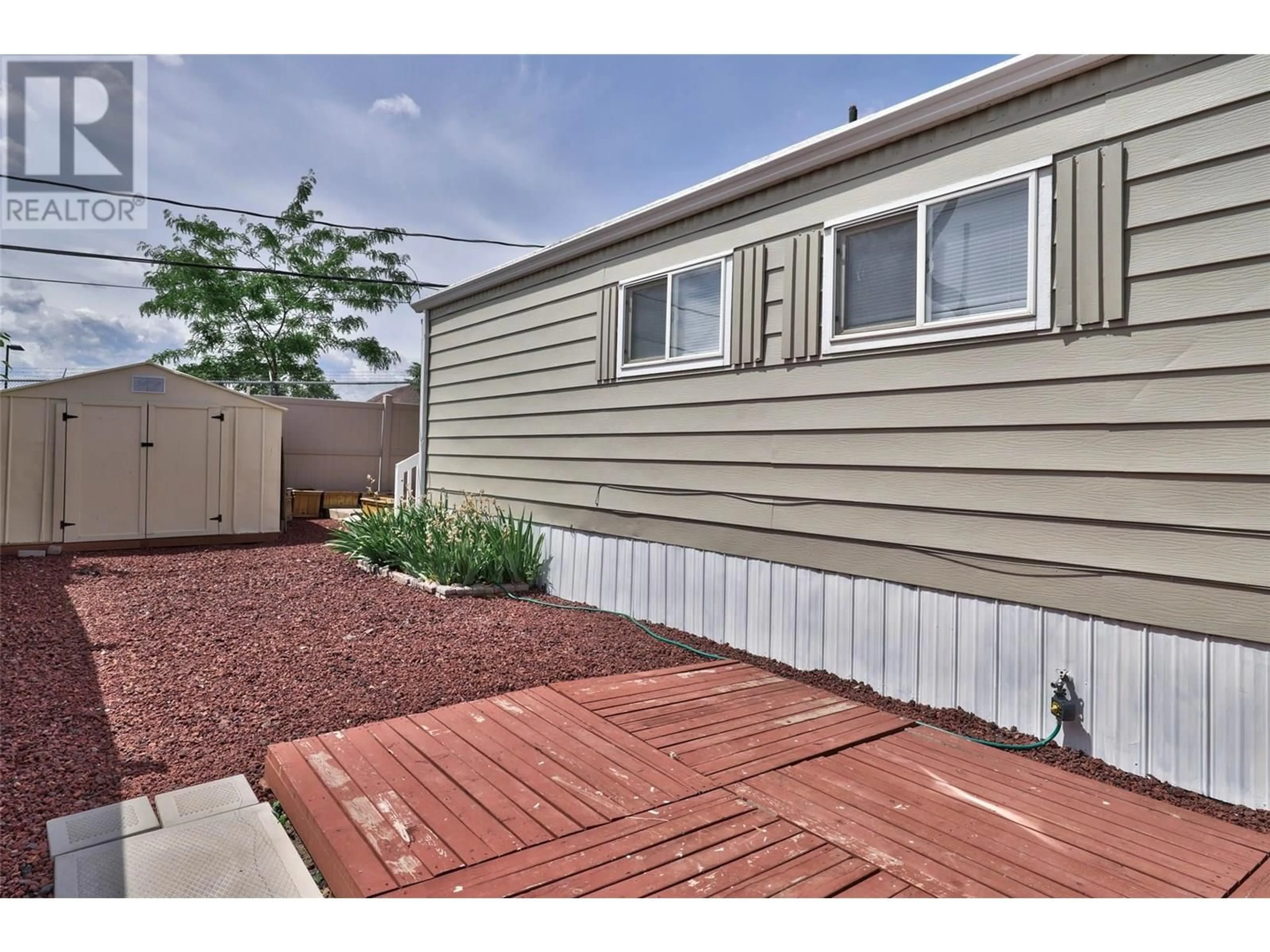 Home with vinyl exterior material, street for 14 - 1440 ORD ROAD, Kamloops British Columbia V2B8P9