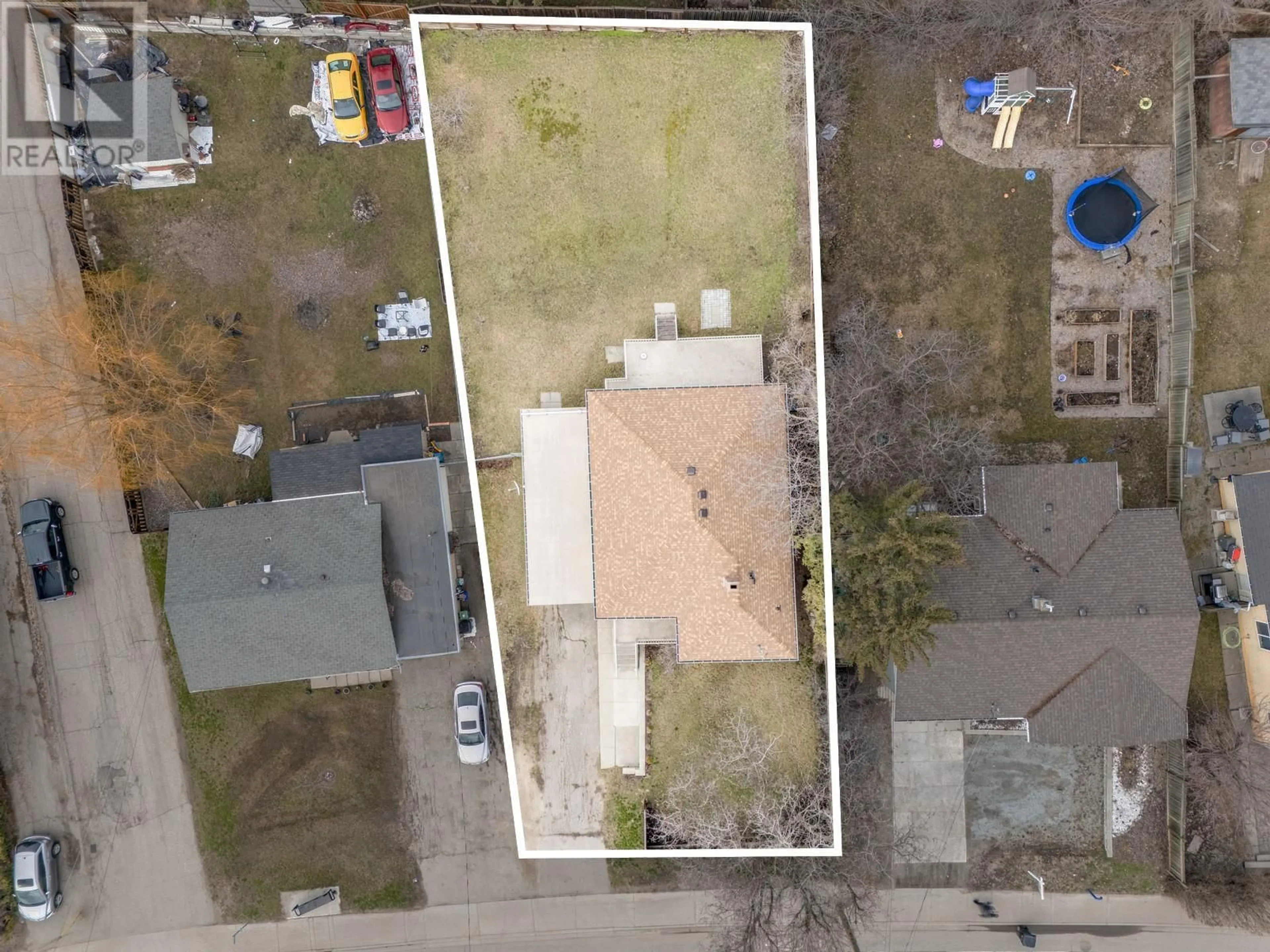 A pic from outside/outdoor area/front of a property/back of a property/a pic from drone, street for 3806 ALEXIS PARK DRIVE, Vernon British Columbia V1T6G9