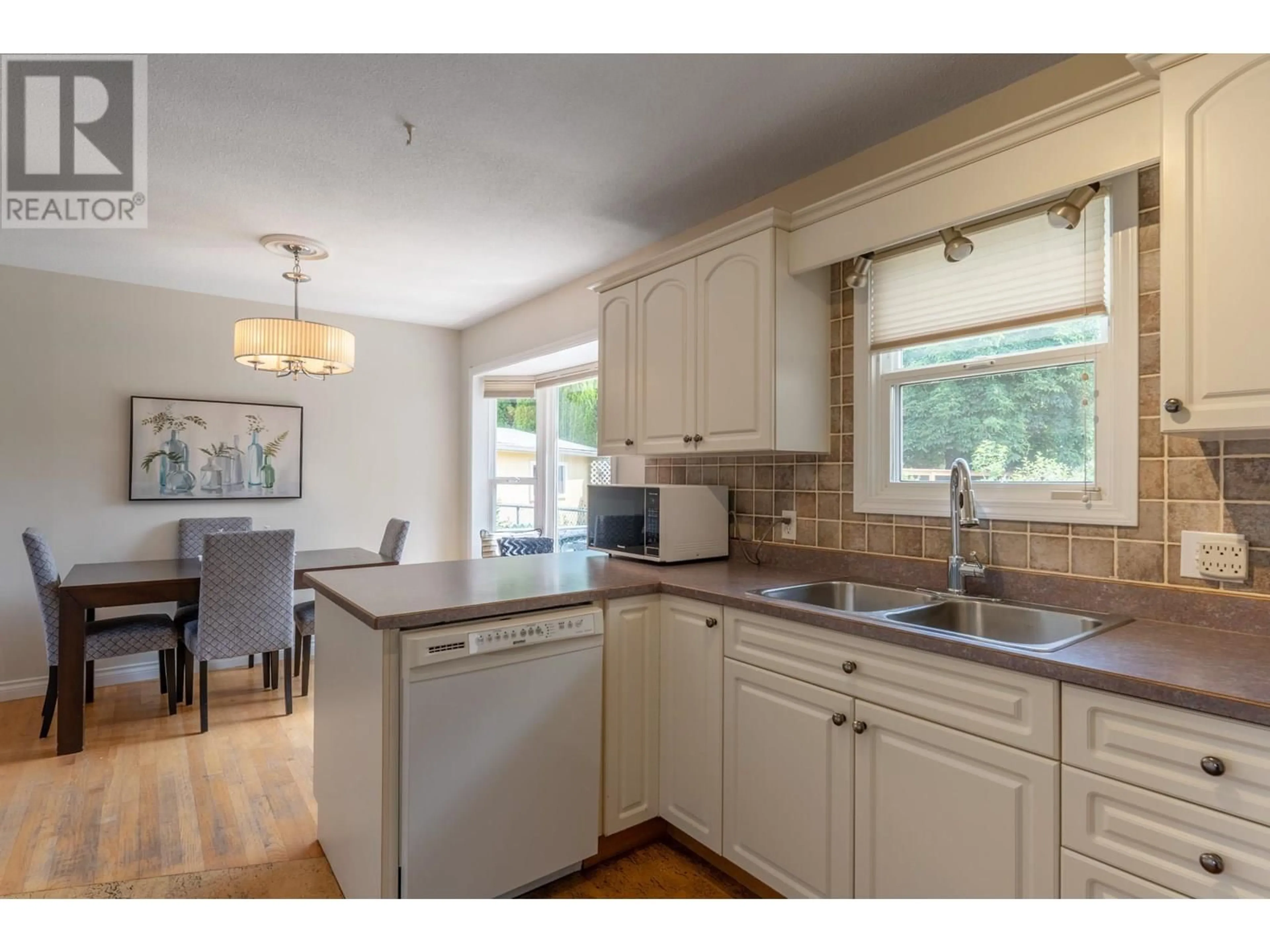 Open concept kitchen, unknown for 405 MACADEN COURT, Kelowna British Columbia V1X2V1