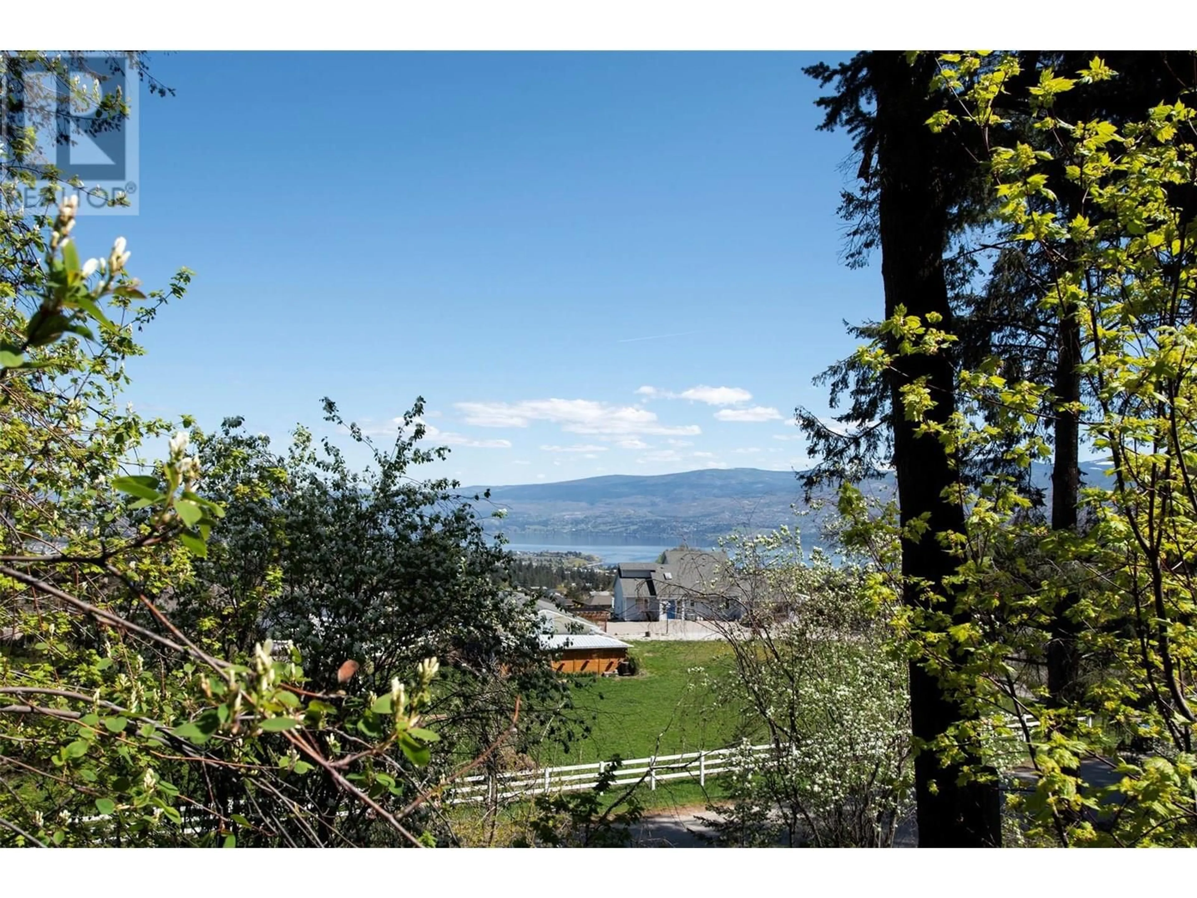 A pic from outside/outdoor area/front of a property/back of a property/a pic from drone, unknown for 3021 MCIVER ROAD, West Kelowna British Columbia V4T1C4