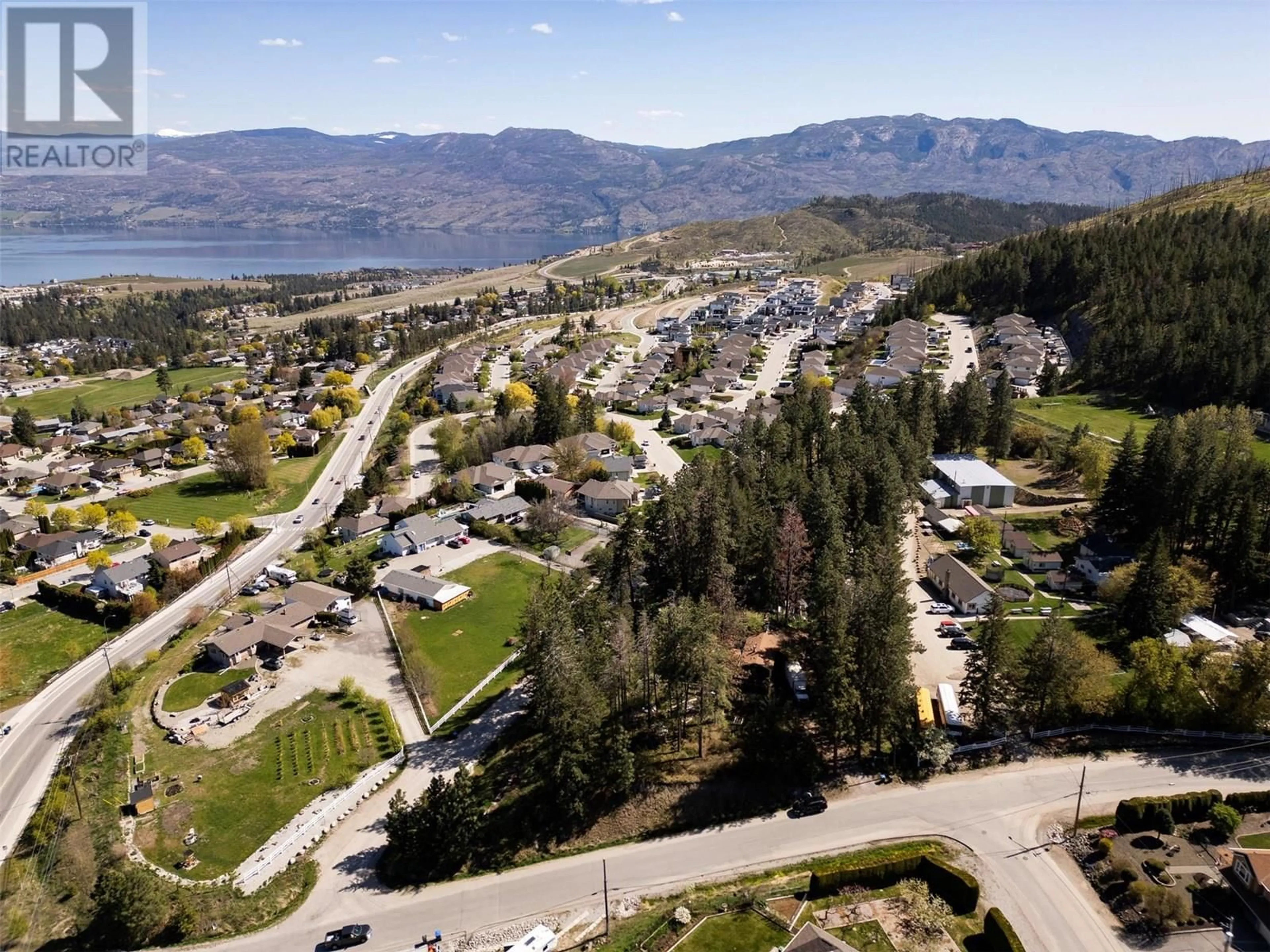 A pic from outside/outdoor area/front of a property/back of a property/a pic from drone, mountain view for 3021 MCIVER ROAD, West Kelowna British Columbia V4T1C4