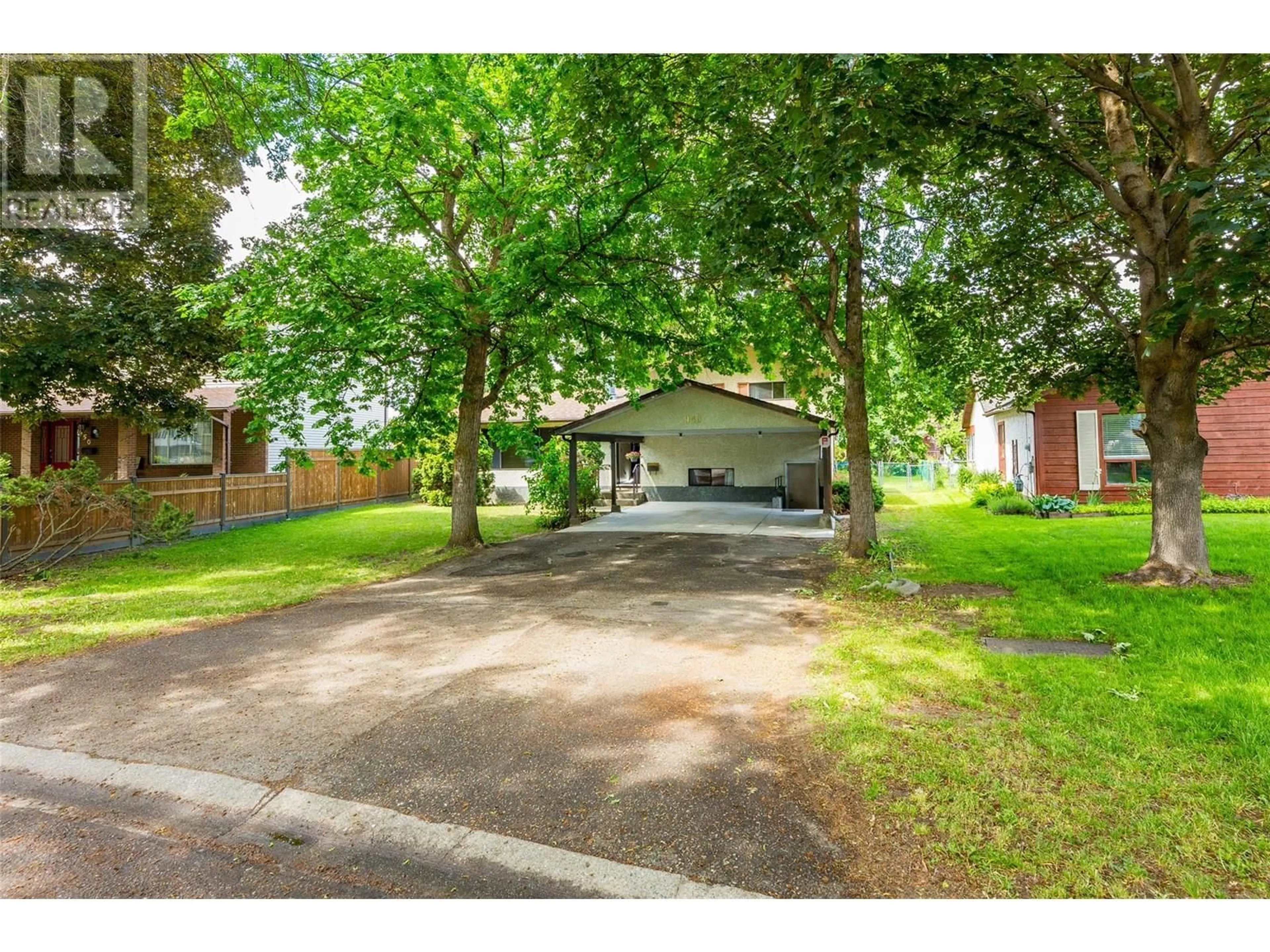 A pic from outside/outdoor area/front of a property/back of a property/a pic from drone, street for 940 DUNDEE ROAD, Kelowna British Columbia V1X5Y3