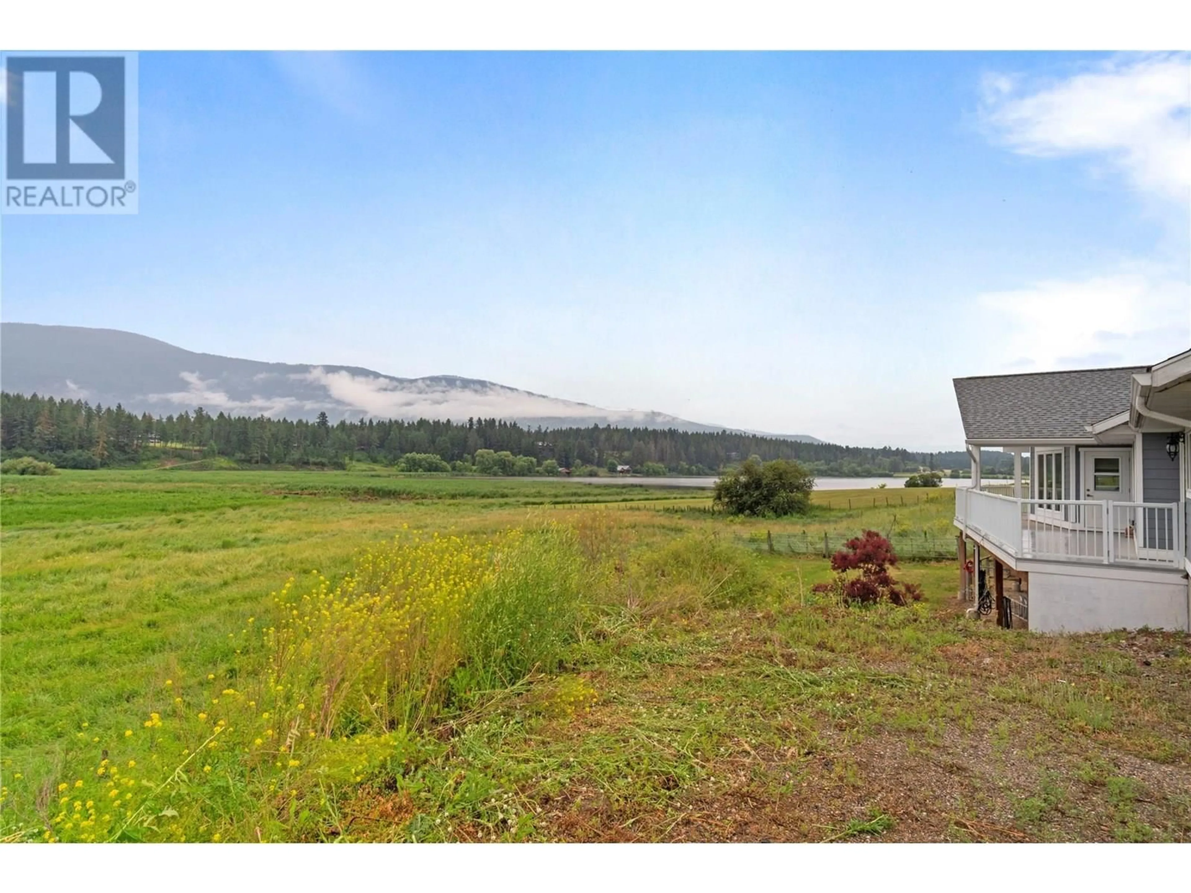 A pic from outside/outdoor area/front of a property/back of a property/a pic from drone, water/lake/river/ocean view for 1477 OTTER LAKE ROAD, Spallumcheen British Columbia V4Y0W2