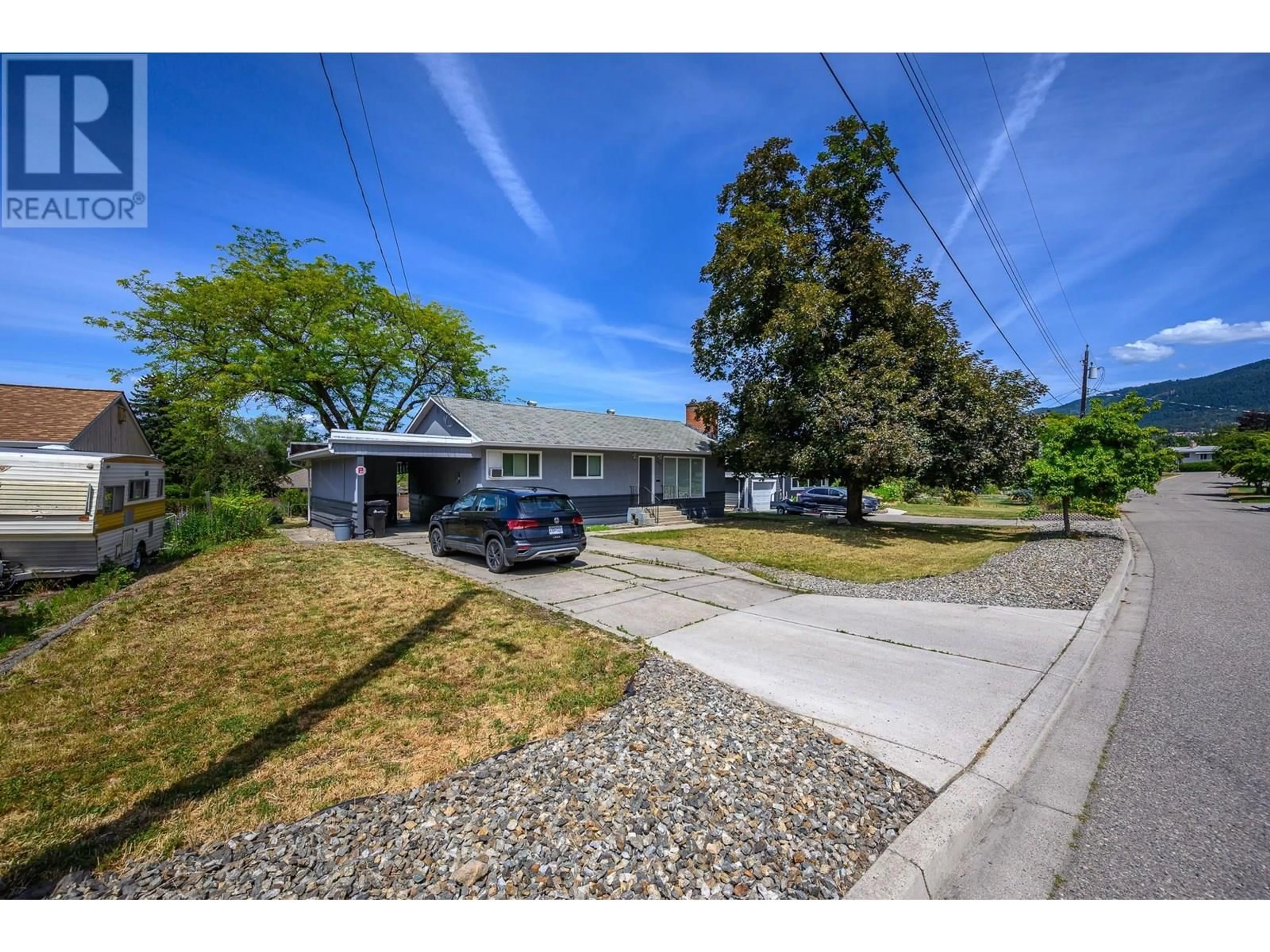A pic from outside/outdoor area/front of a property/back of a property/a pic from drone, street for 1903 29 CRESCENT, Vernon British Columbia V1T1Y6