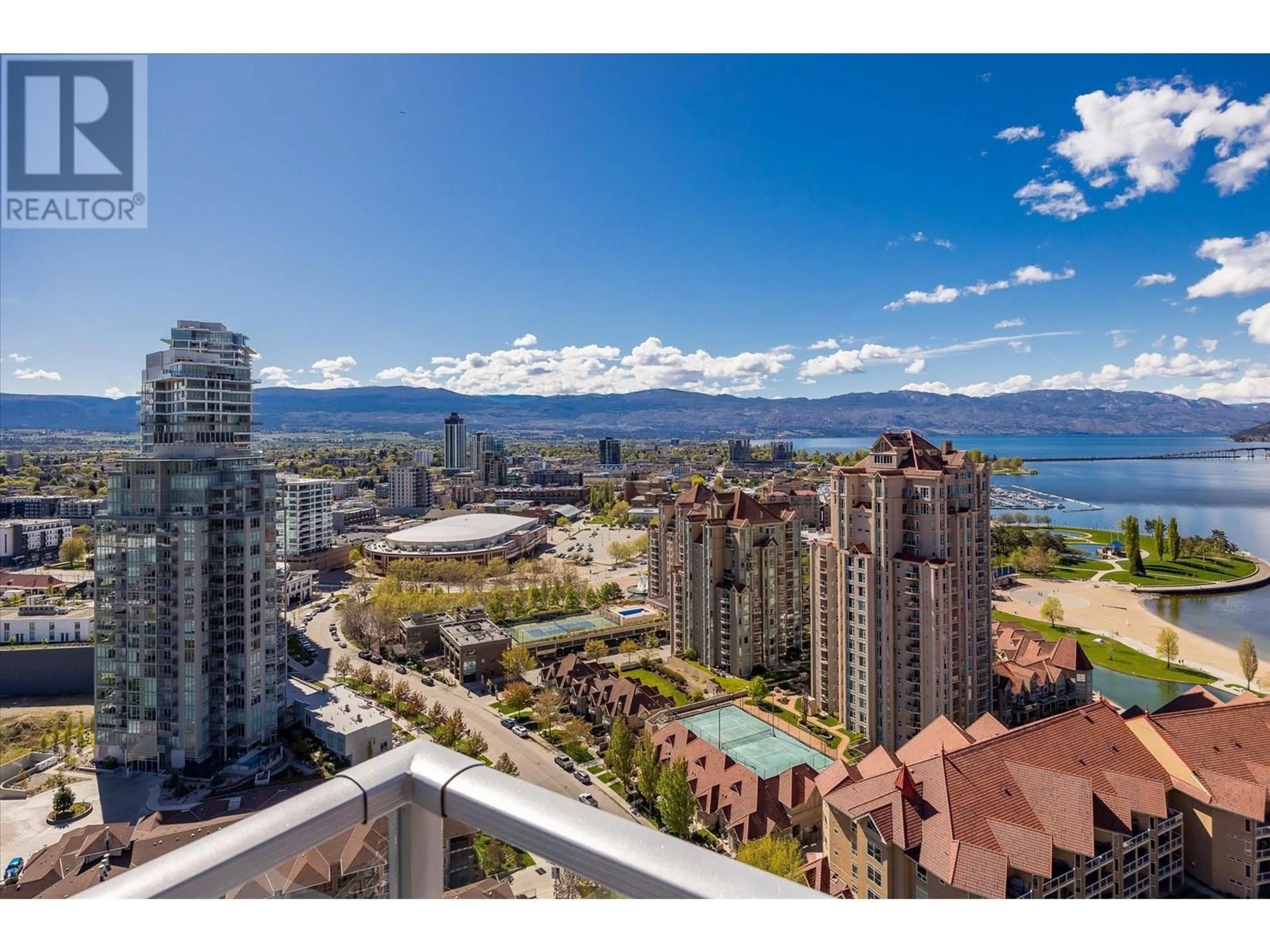 A pic from outside/outdoor area/front of a property/back of a property/a pic from drone, water/lake/river/ocean view for 2603 - 1075 SUNSET DRIVE, Kelowna British Columbia V1Y9Y9