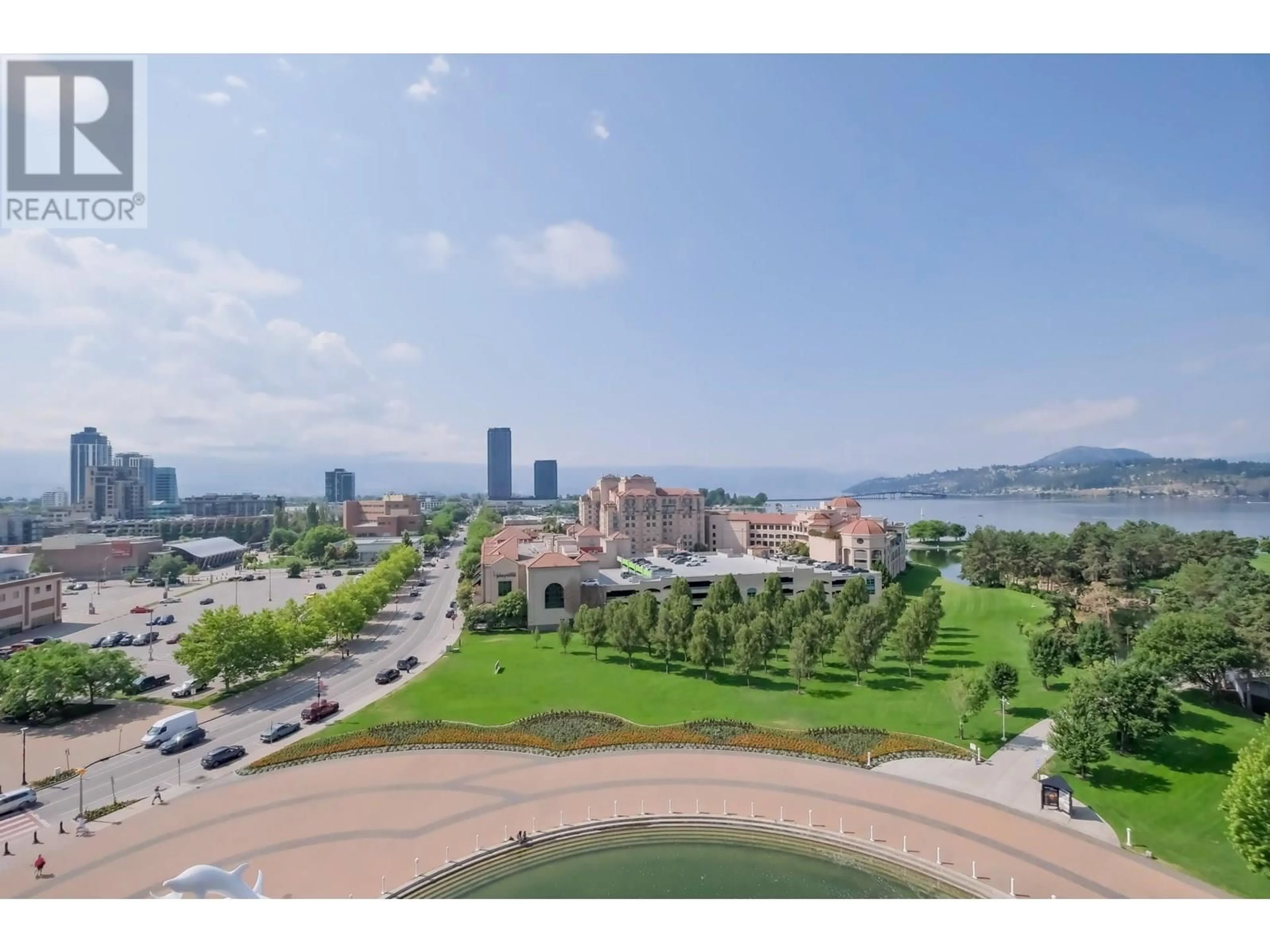 A pic from outside/outdoor area/front of a property/back of a property/a pic from drone, water/lake/river/ocean view for 1103 - 1160 SUNSET DRIVE, Kelowna British Columbia V1Y9P7