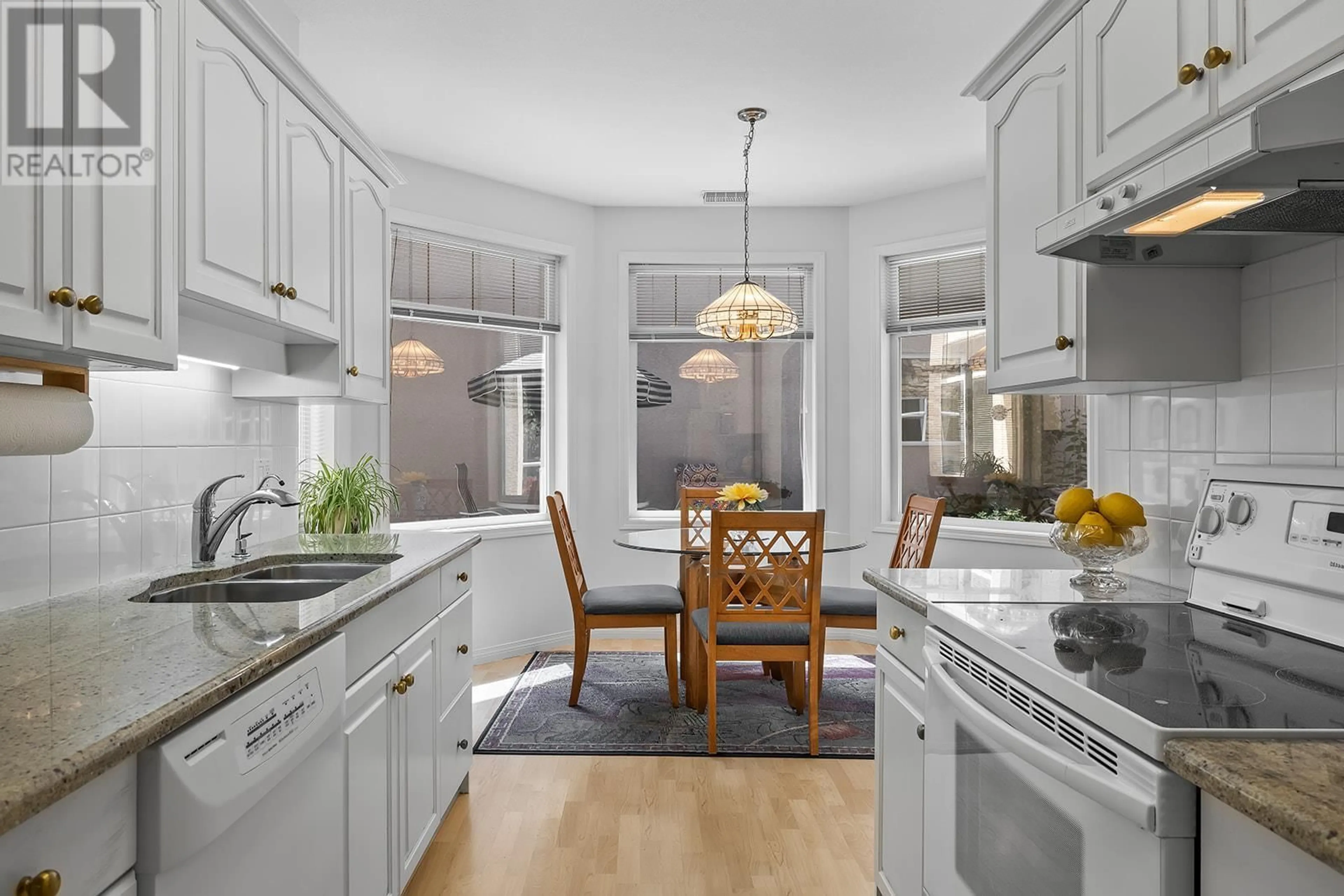Open concept kitchen, ceramic/tile floor for 210 - 634 LEQUIME ROAD, Kelowna British Columbia V1W1A4