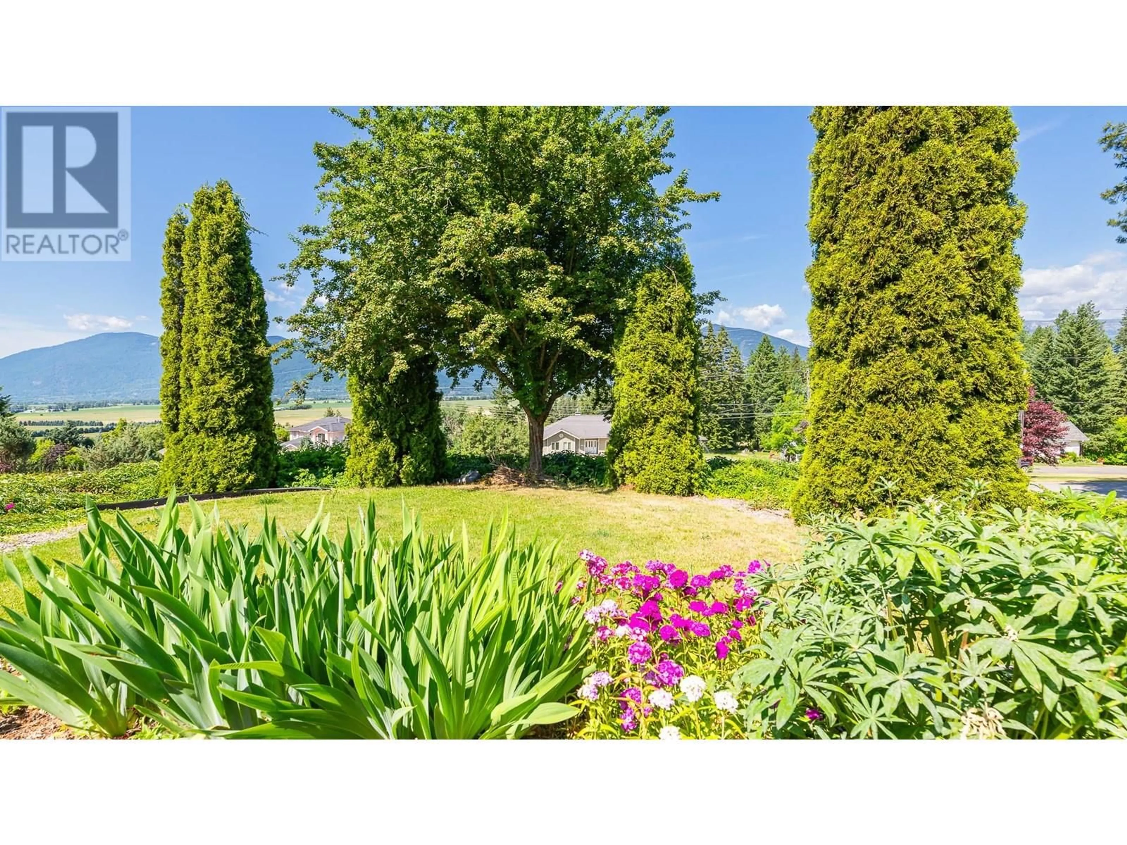 A pic from outside/outdoor area/front of a property/back of a property/a pic from drone, forest/trees view for 1506 1ST  NW AVENUE, Creston British Columbia V0B1G6