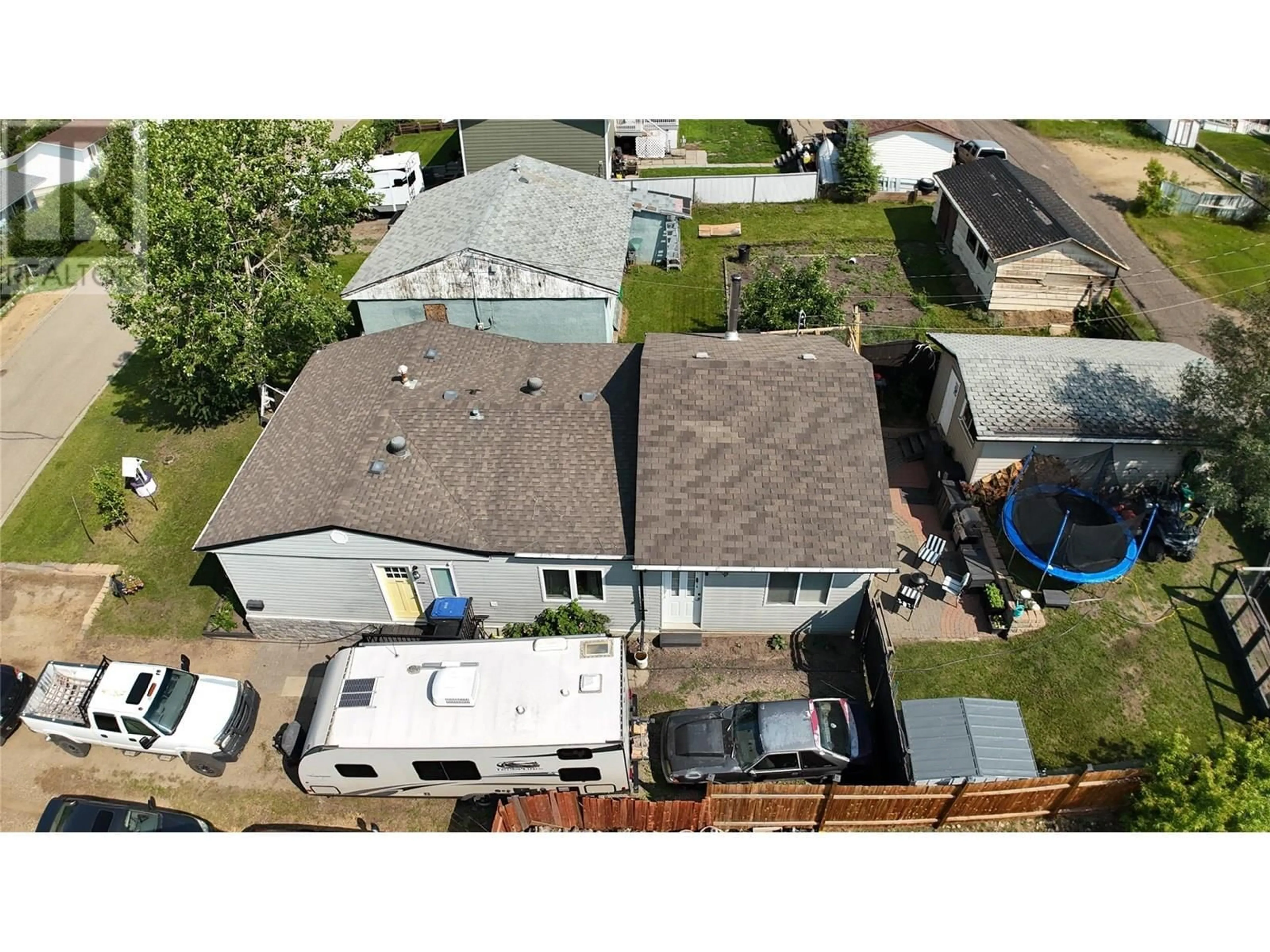 A pic from outside/outdoor area/front of a property/back of a property/a pic from drone, street for 9720 9 STREET, Dawson Creek British Columbia V1G3S6