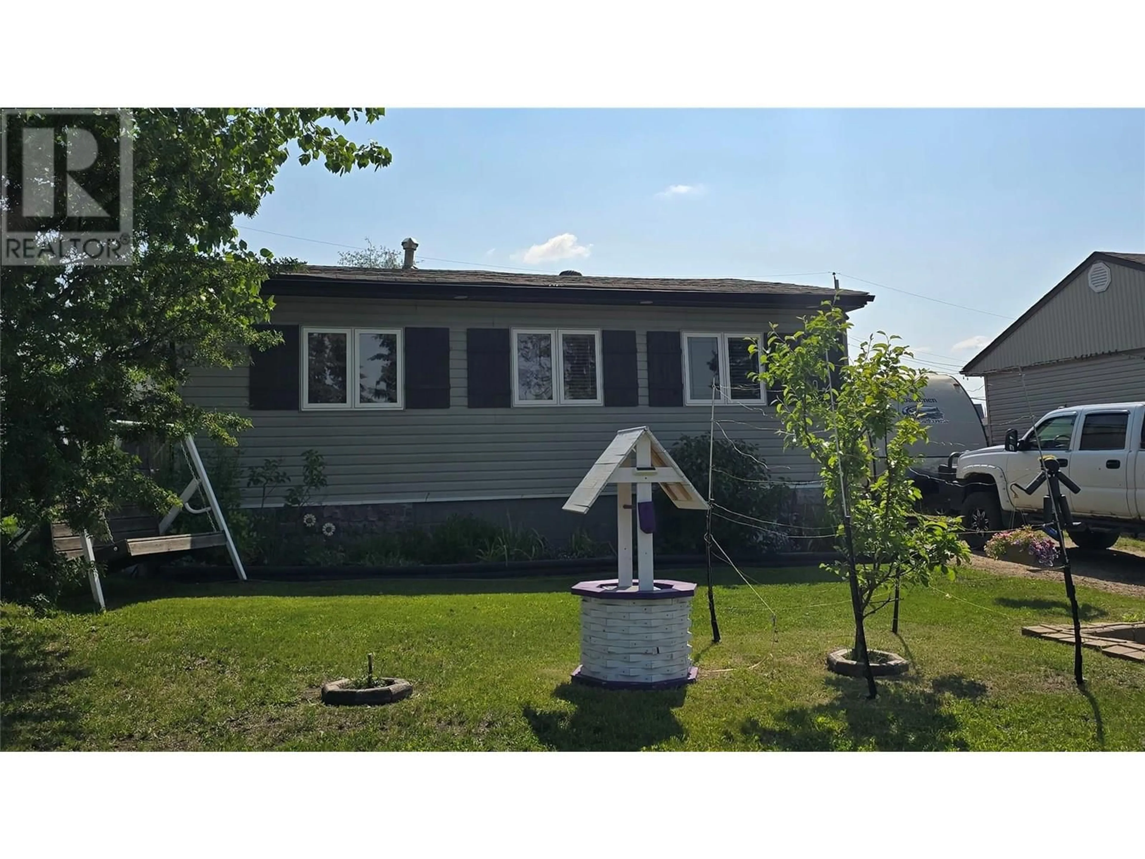 Home with vinyl exterior material, unknown for 9720 9 STREET, Dawson Creek British Columbia V1G3S6