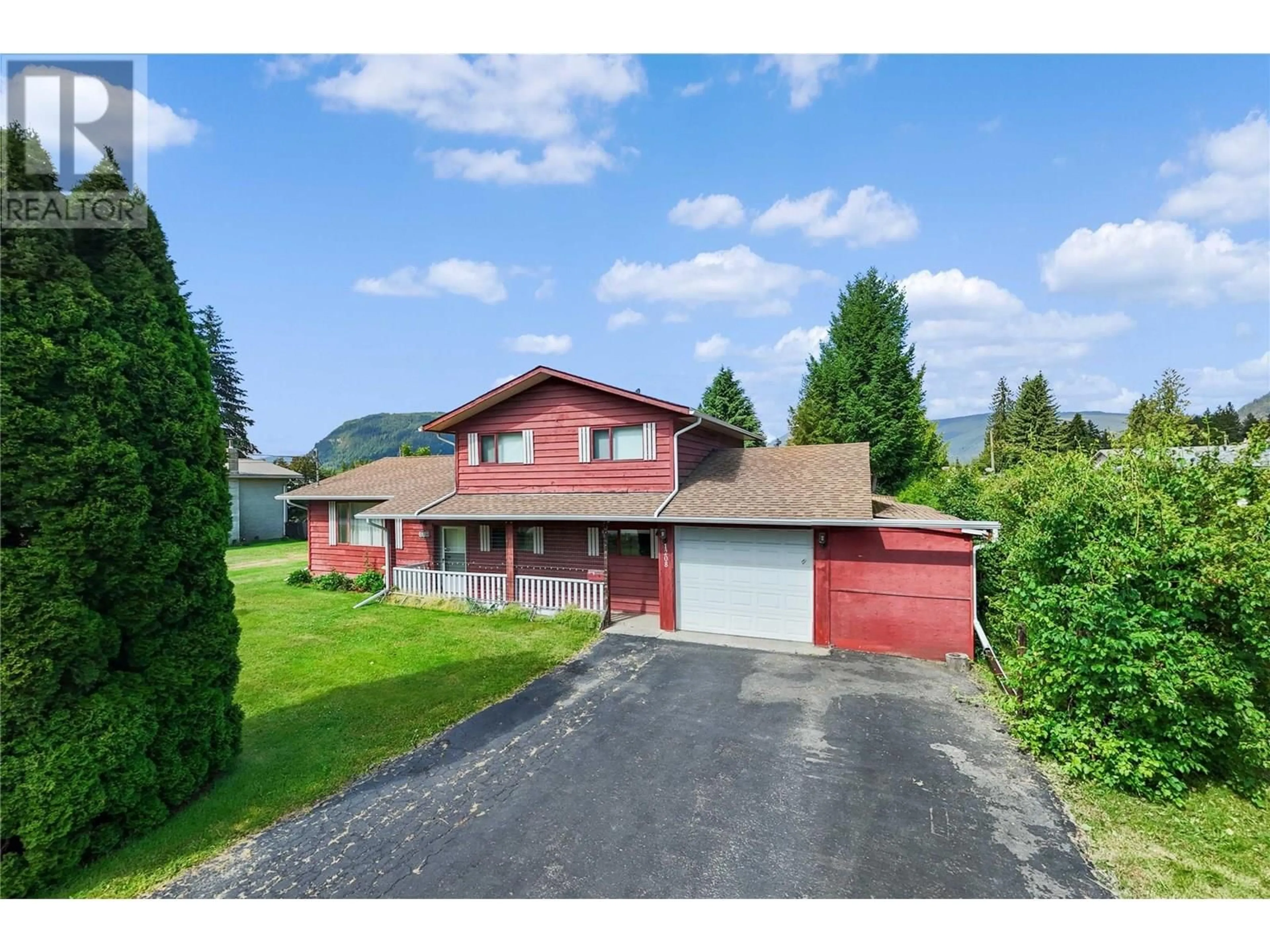 A pic from outside/outdoor area/front of a property/back of a property/a pic from drone, street for 1208 SHERLOCK ROAD, Sicamous British Columbia V0E2V1