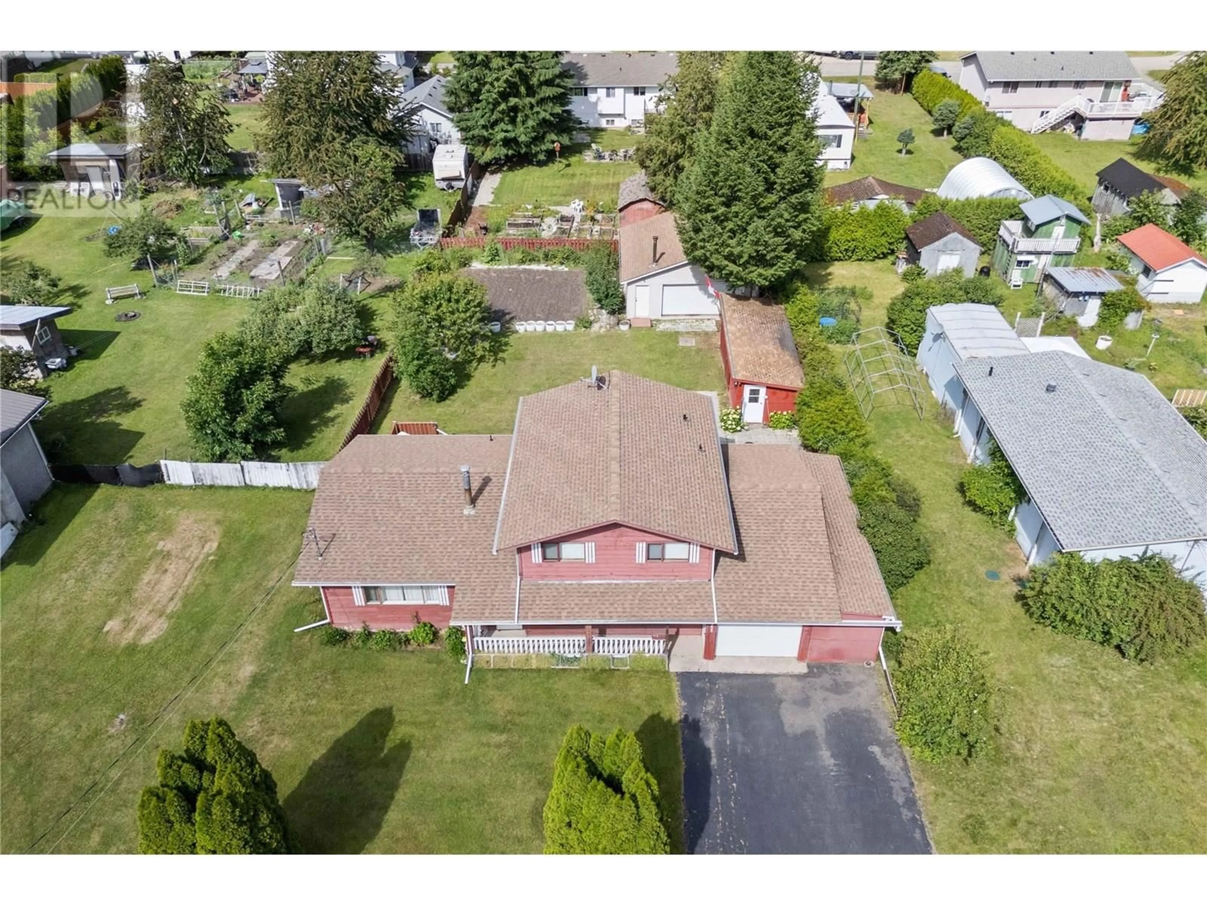 A pic from outside/outdoor area/front of a property/back of a property/a pic from drone, street for 1208 SHERLOCK ROAD, Sicamous British Columbia V0E2V1