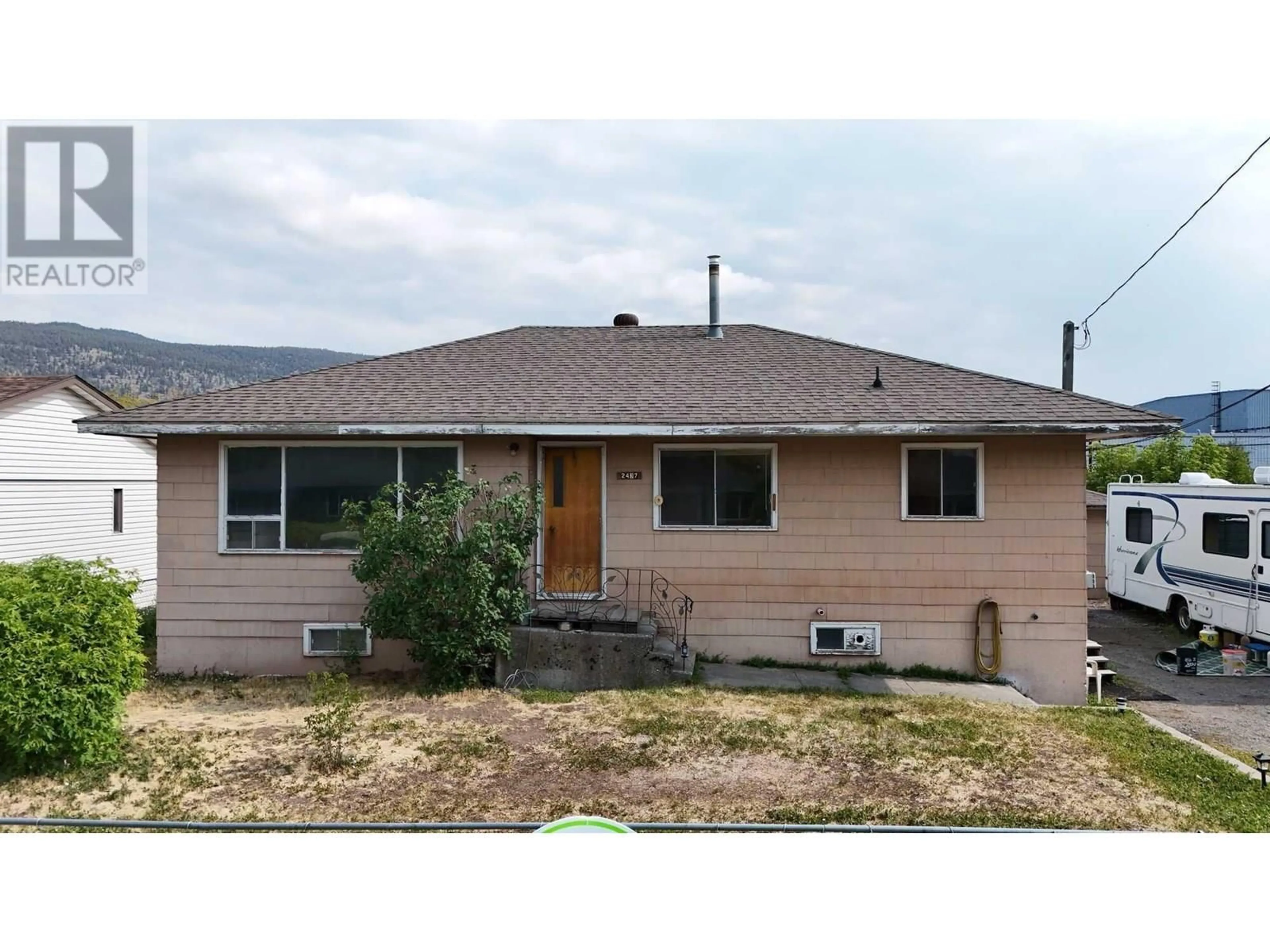 Home with vinyl exterior material, mountain view for 2437 COUTLEE AVENUE, Merritt British Columbia V1K1B8