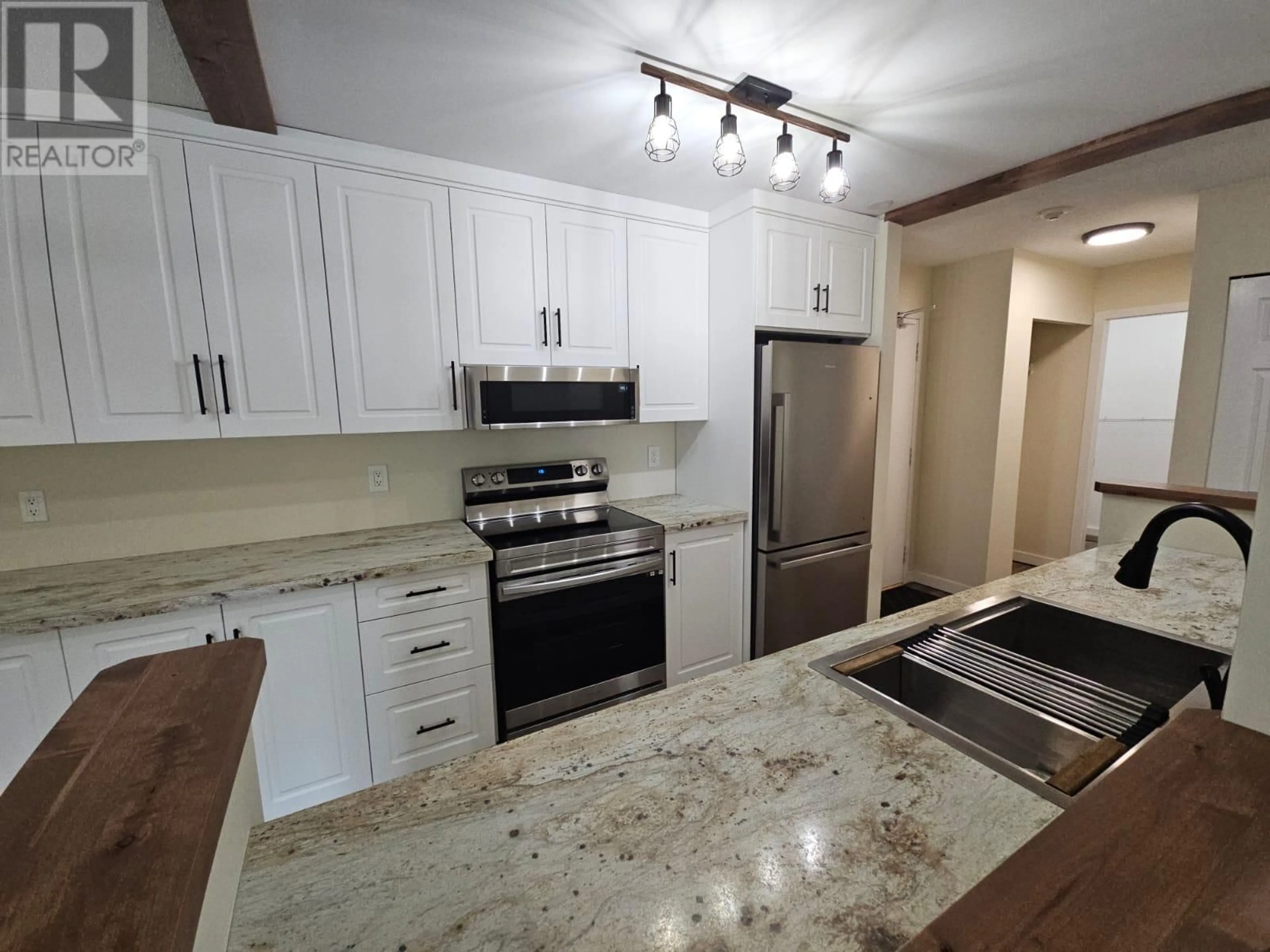 Open concept kitchen, unknown for 110 - 320 NORTHGATE OTHER, Tumbler Ridge British Columbia V0C2W0