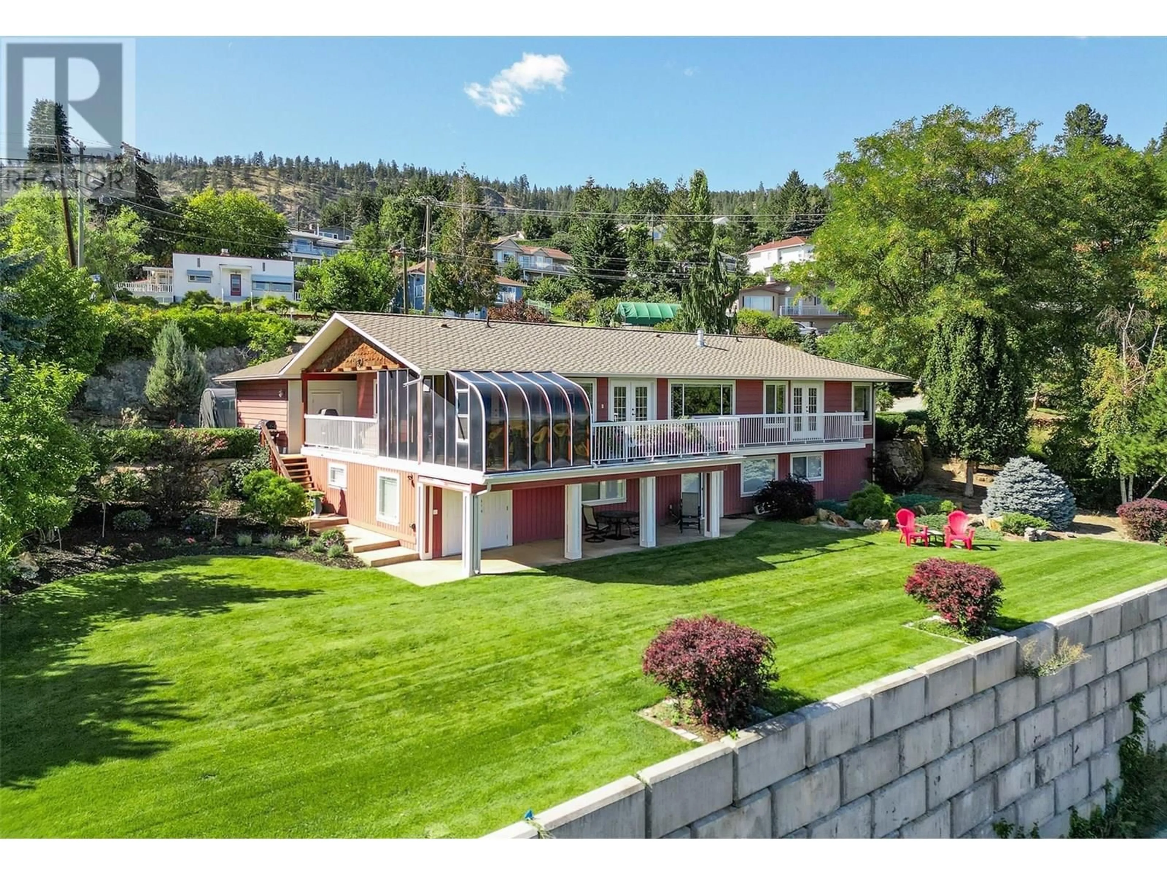 A pic from outside/outdoor area/front of a property/back of a property/a pic from drone, mountain view for 4649 PRINCETON AVENUE, Peachland British Columbia V0H1X7