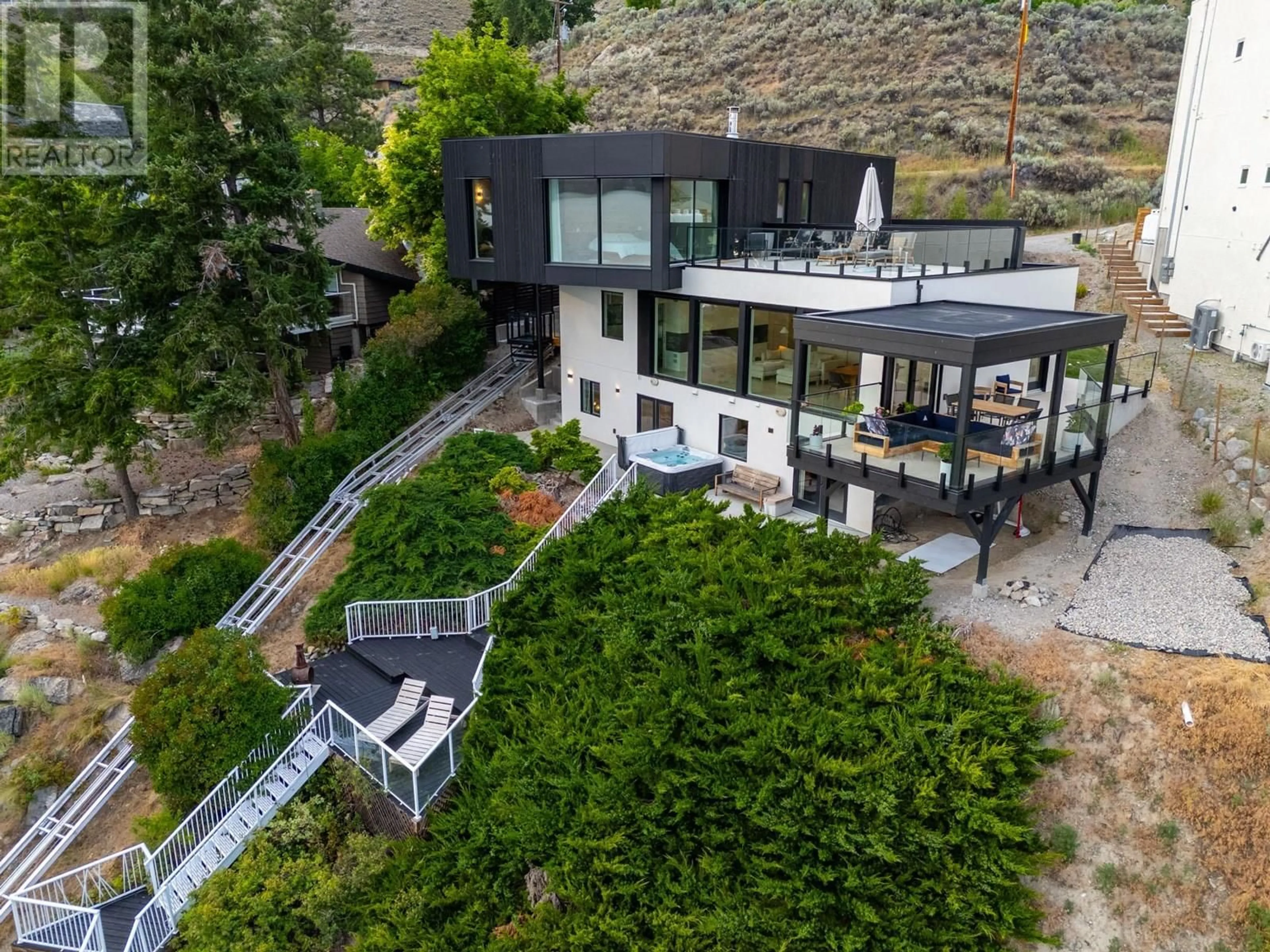 A pic from outside/outdoor area/front of a property/back of a property/a pic from drone, mountain view for 6857 INDIAN ROCK ROAD, Naramata British Columbia V0H1N1