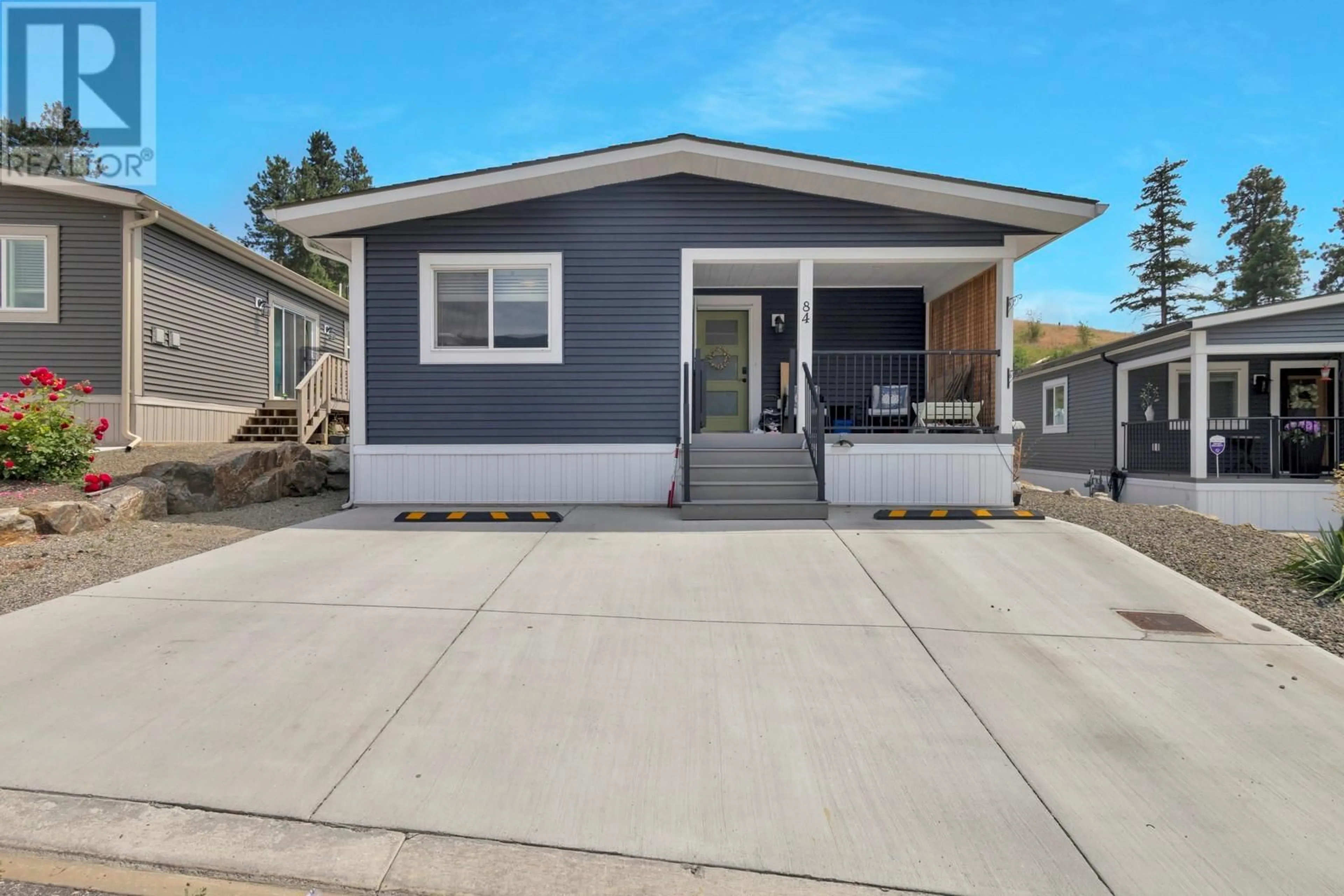 Home with vinyl exterior material, street for 84 - 1835 NANCEE WAY COURT, West Kelowna British Columbia V1Z4C1