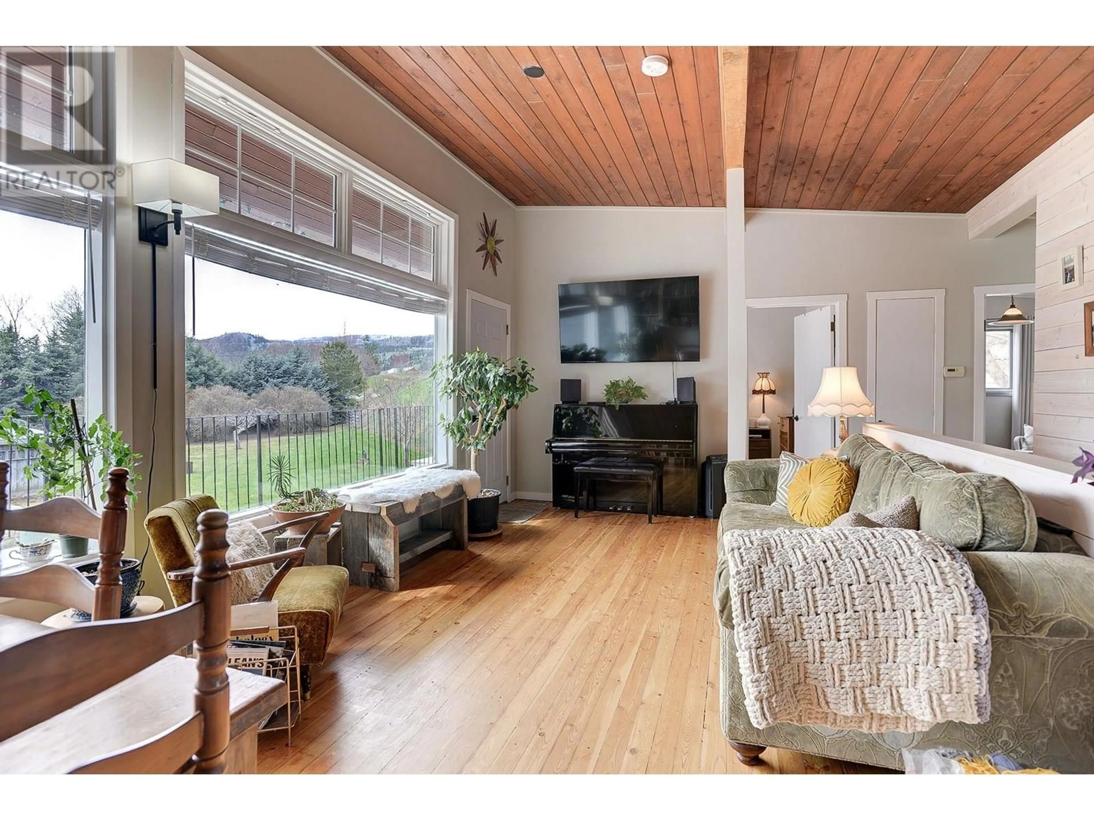 Living room with furniture, wood/laminate floor for 570 DAIRY ROAD, Kamloops British Columbia V2B8N5