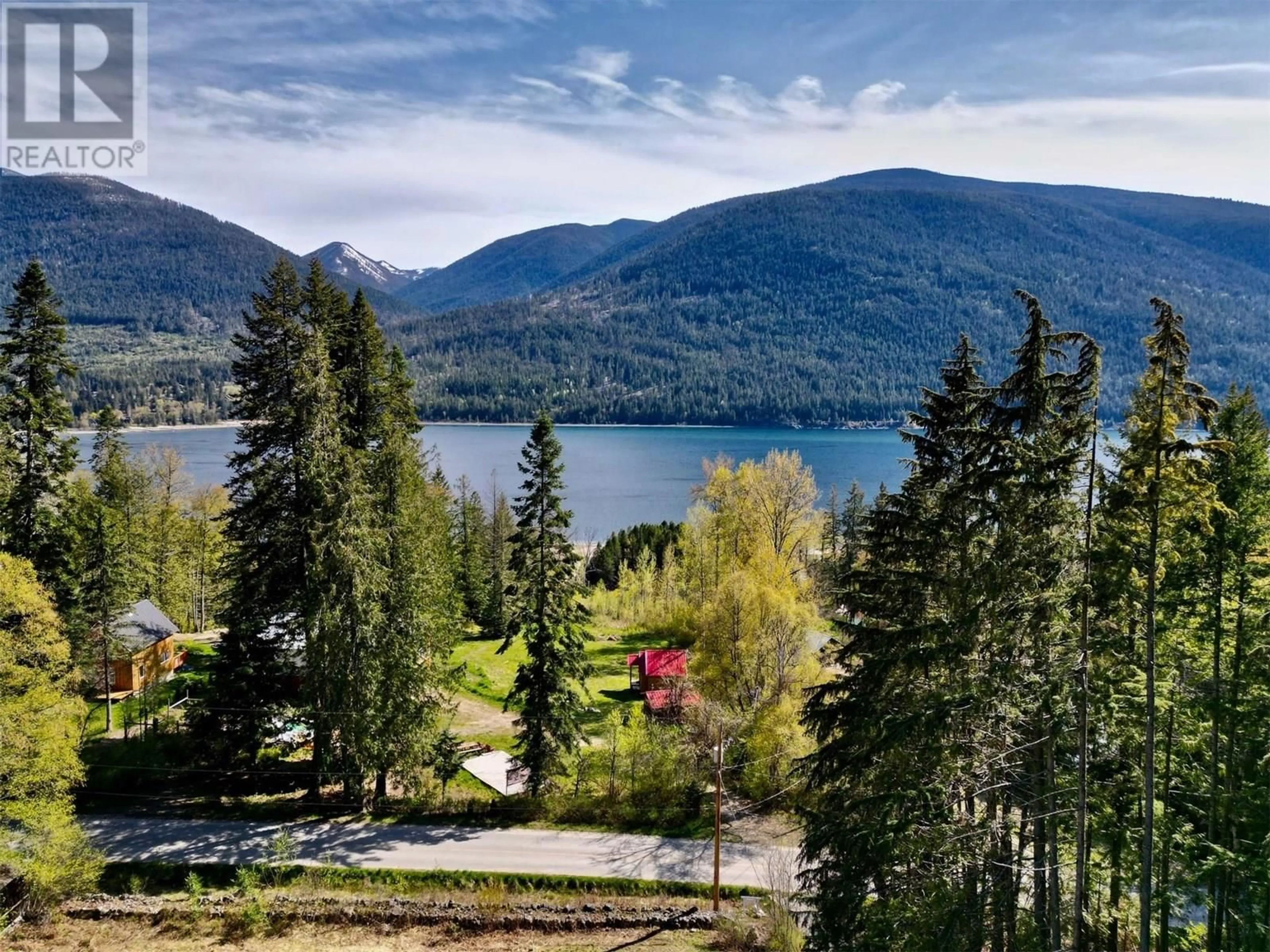A pic from outside/outdoor area/front of a property/back of a property/a pic from drone, water/lake/river/ocean view for 5759 LONGBEACH ROAD, Nelson British Columbia V1L6P2