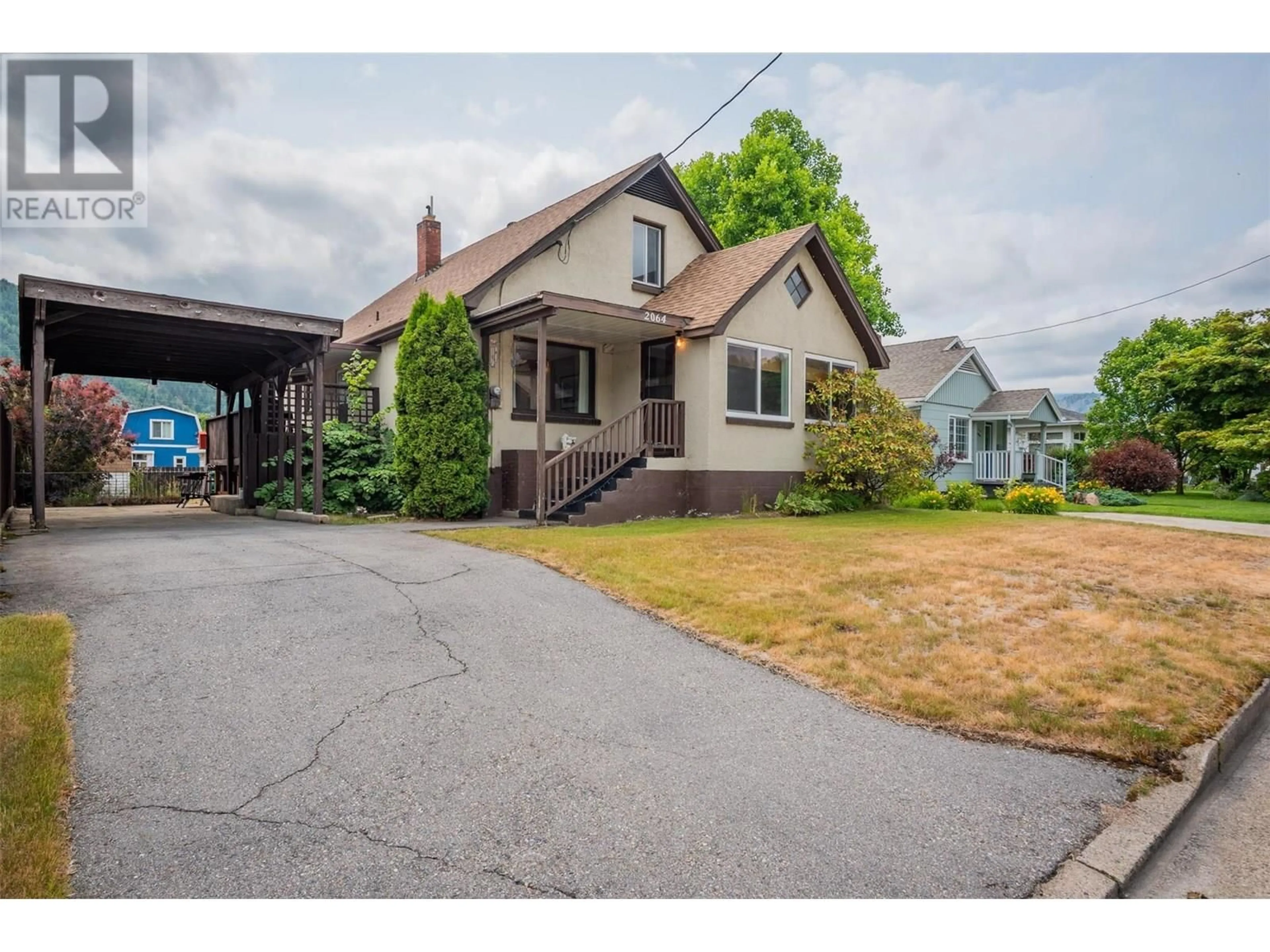 A pic from outside/outdoor area/front of a property/back of a property/a pic from drone, street for 2064 SEVENTH AVENUE, Trail British Columbia V1R3C5