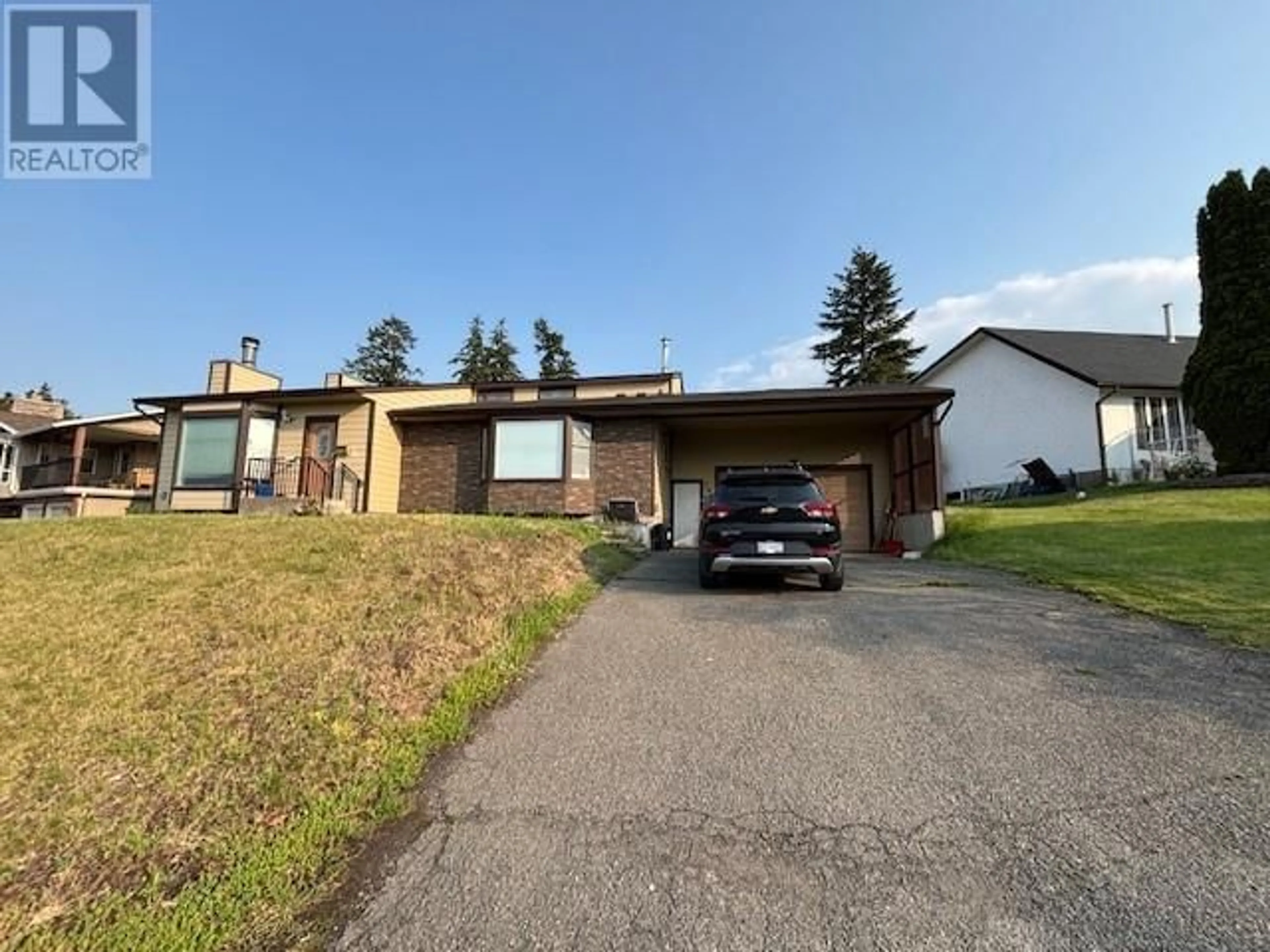 A pic from outside/outdoor area/front of a property/back of a property/a pic from drone, street for 755 FLEMING DRIVE, Kamloops British Columbia V1S1A2