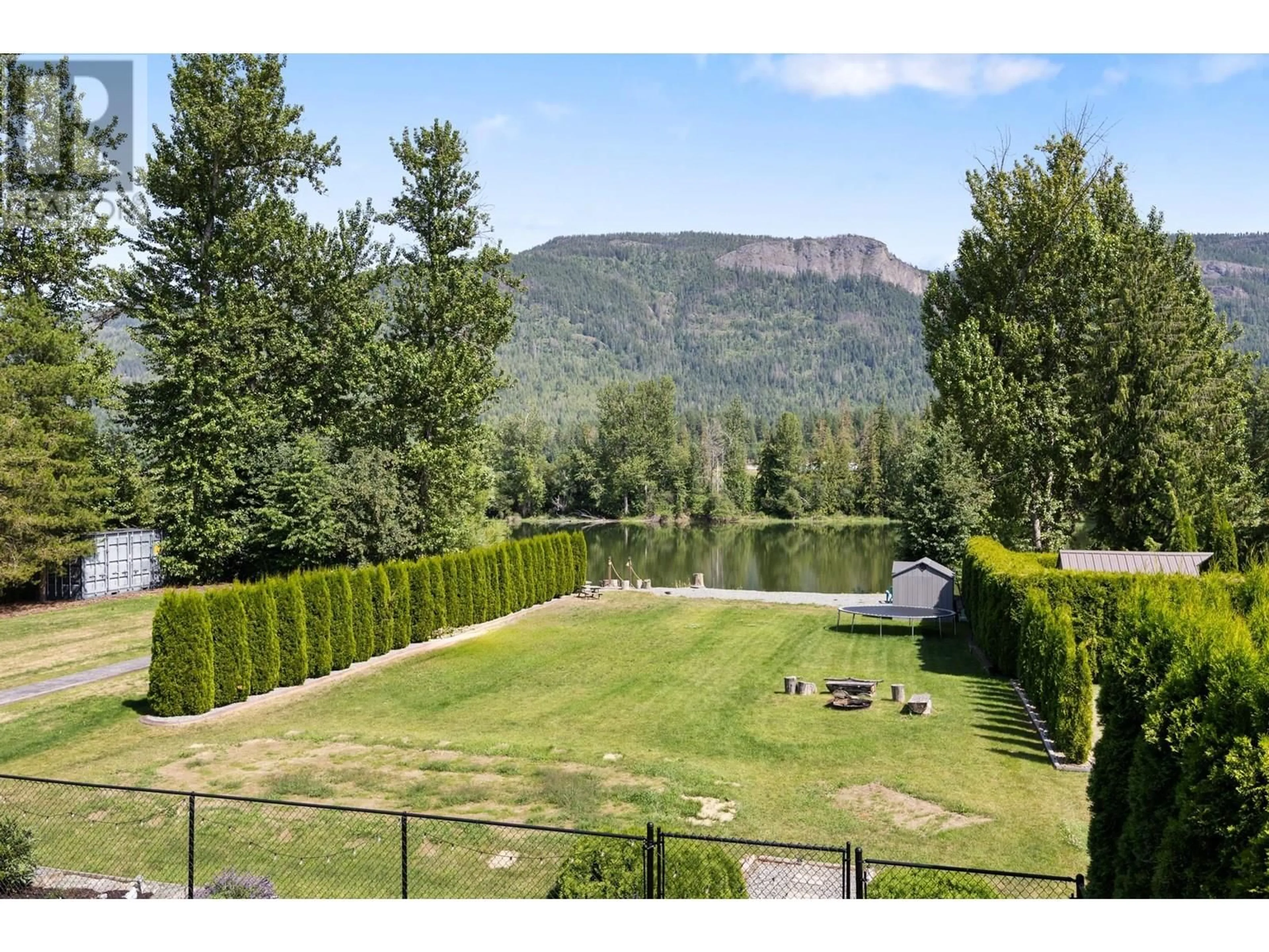 A pic from outside/outdoor area/front of a property/back of a property/a pic from drone, mountain view for 142 CARLIN STREET, Grindrod British Columbia V0E1Y0