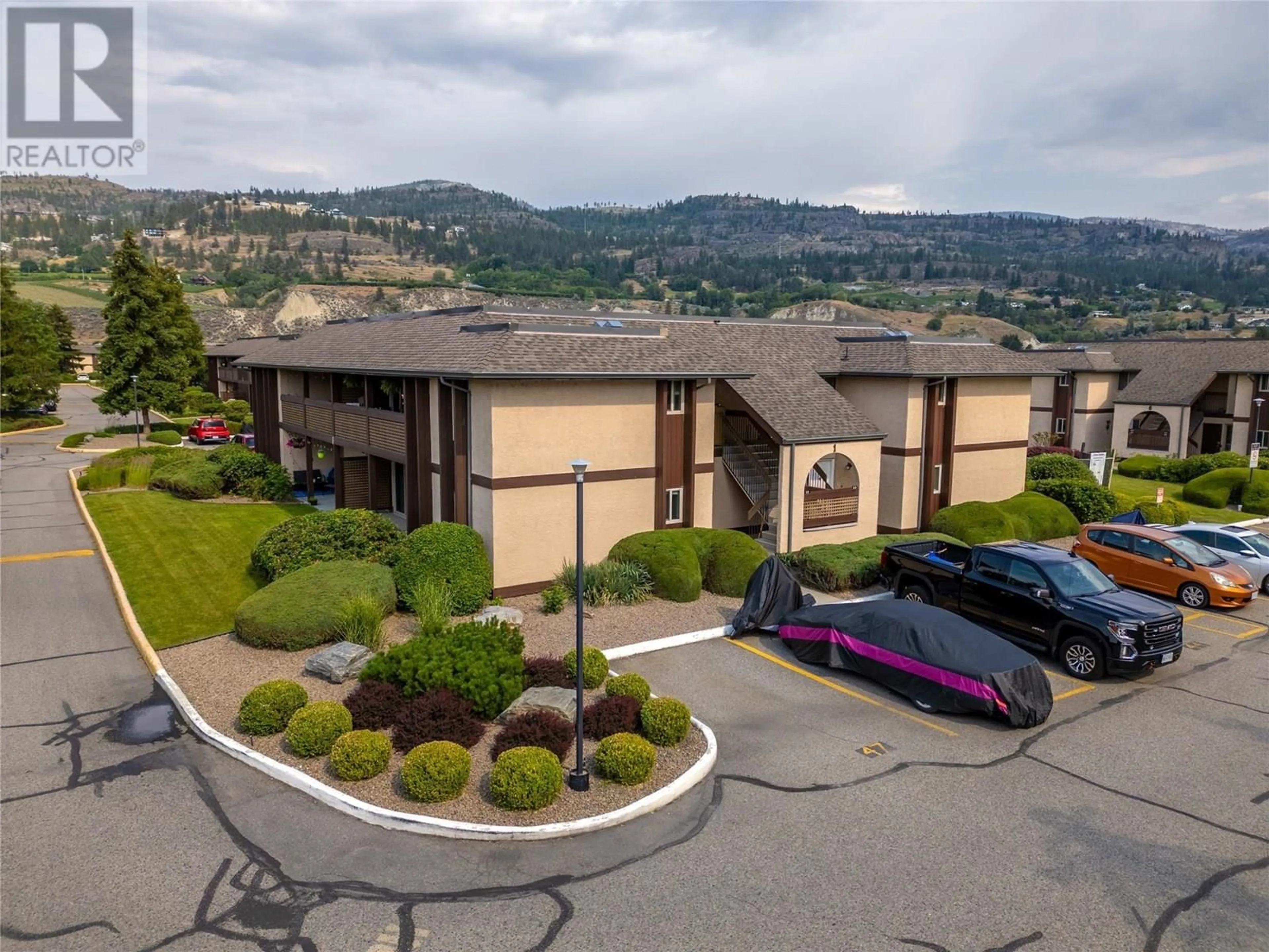 A pic from outside/outdoor area/front of a property/back of a property/a pic from drone, mountain view for 124 - 3140 WILSON STREET, Penticton British Columbia V2A7K4