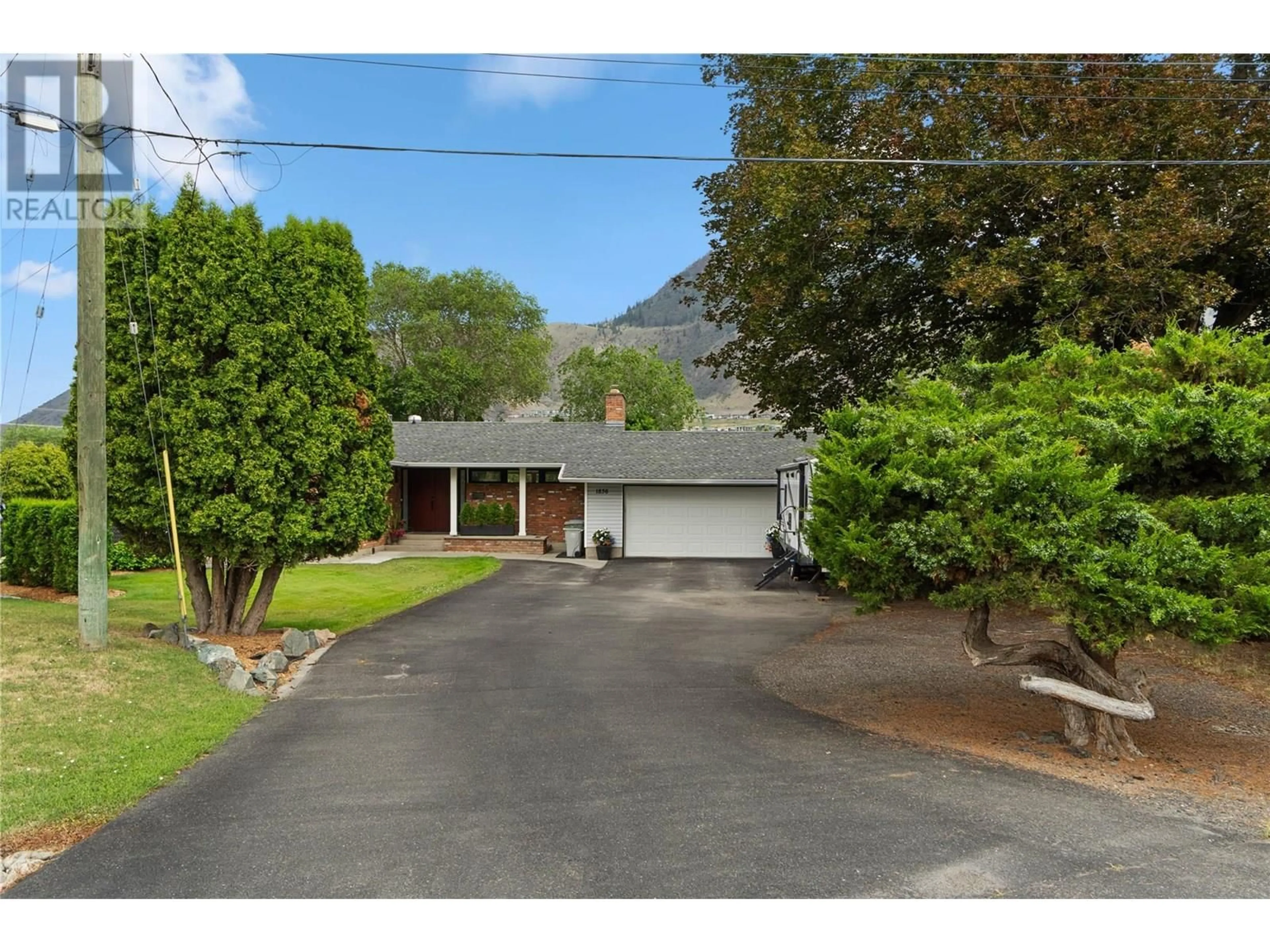 A pic from outside/outdoor area/front of a property/back of a property/a pic from drone, street for 1836 RUSSET WYND, Kamloops British Columbia V2C4N5