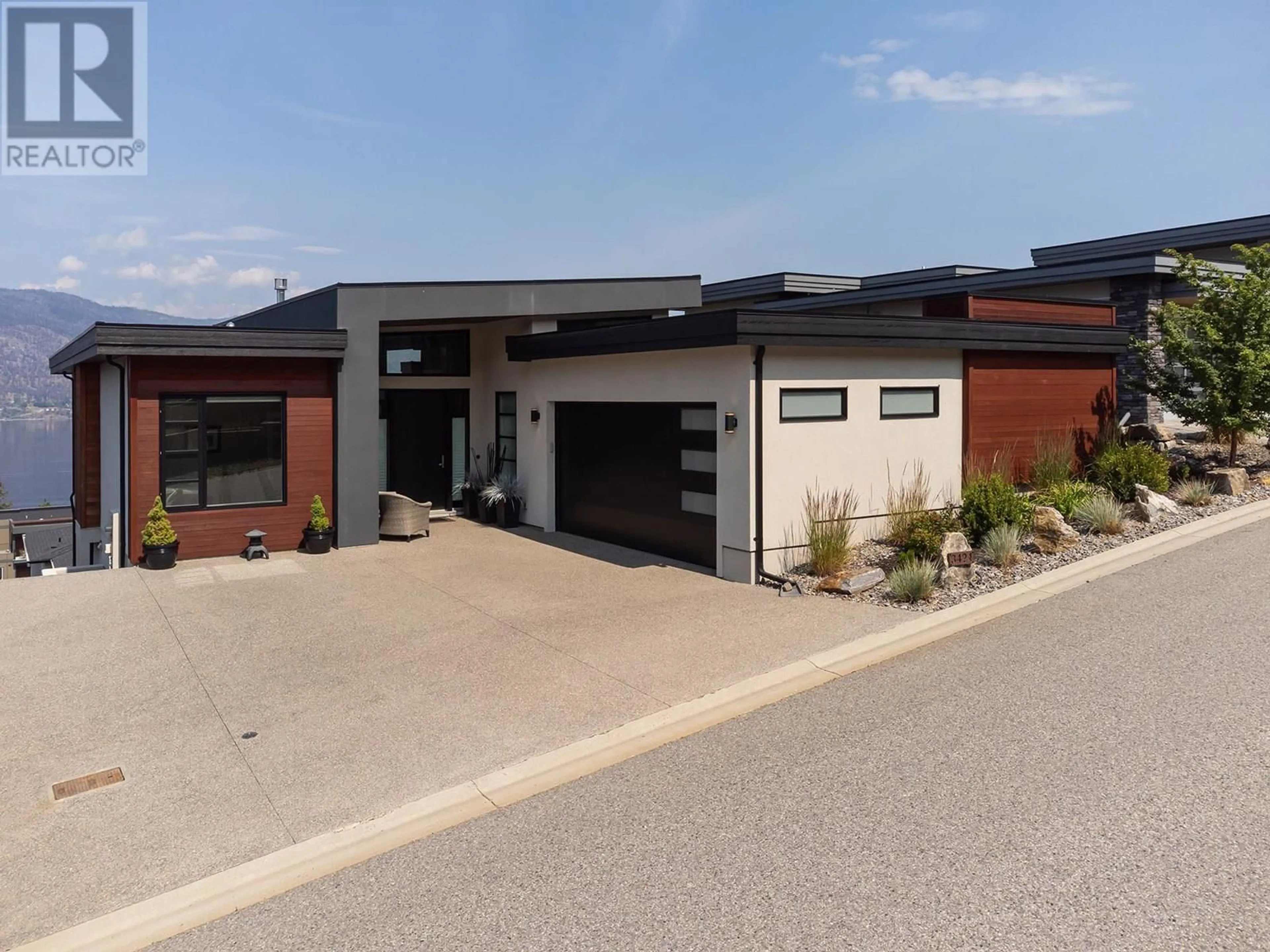 Home with brick exterior material, street for 3424 WATER BIRCH CIRCLE, Kelowna British Columbia V1V3G1
