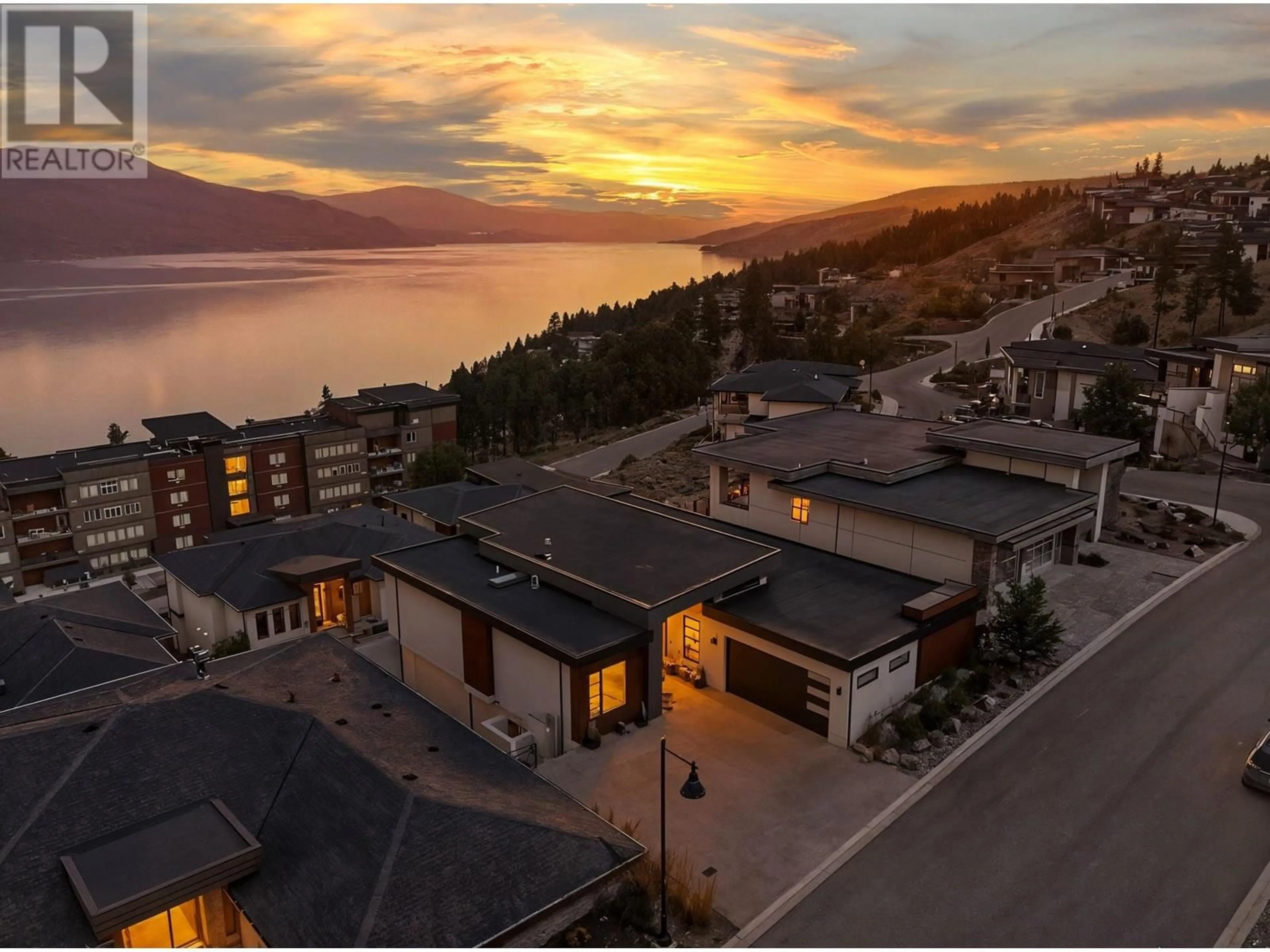 A pic from outside/outdoor area/front of a property/back of a property/a pic from drone, mountain view for 3424 WATER BIRCH CIRCLE, Kelowna British Columbia V1V3G1
