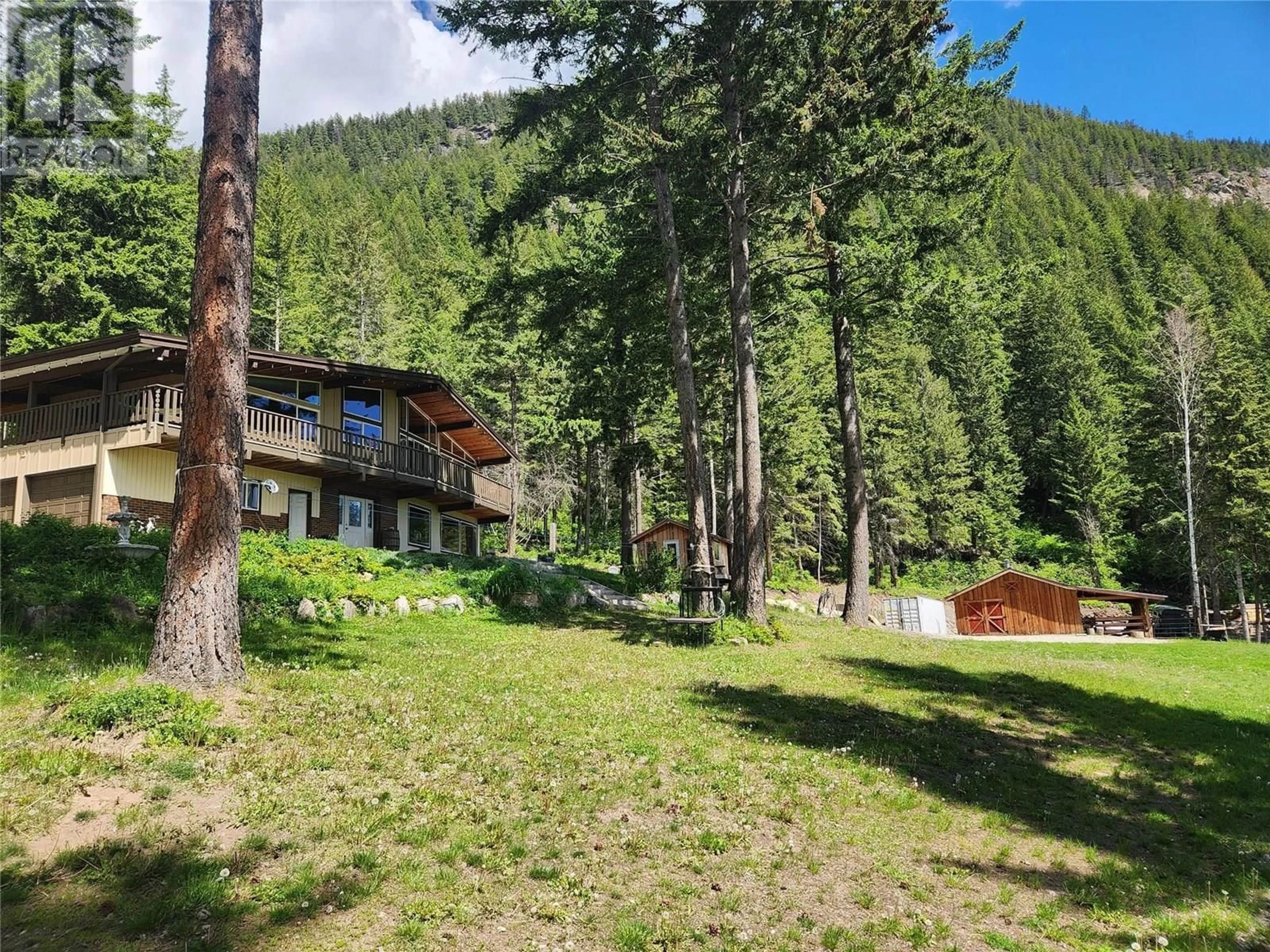 A pic from outside/outdoor area/front of a property/back of a property/a pic from drone, forest/trees view for 922 MOBLEY ROAD, Tappen British Columbia V0E2X1