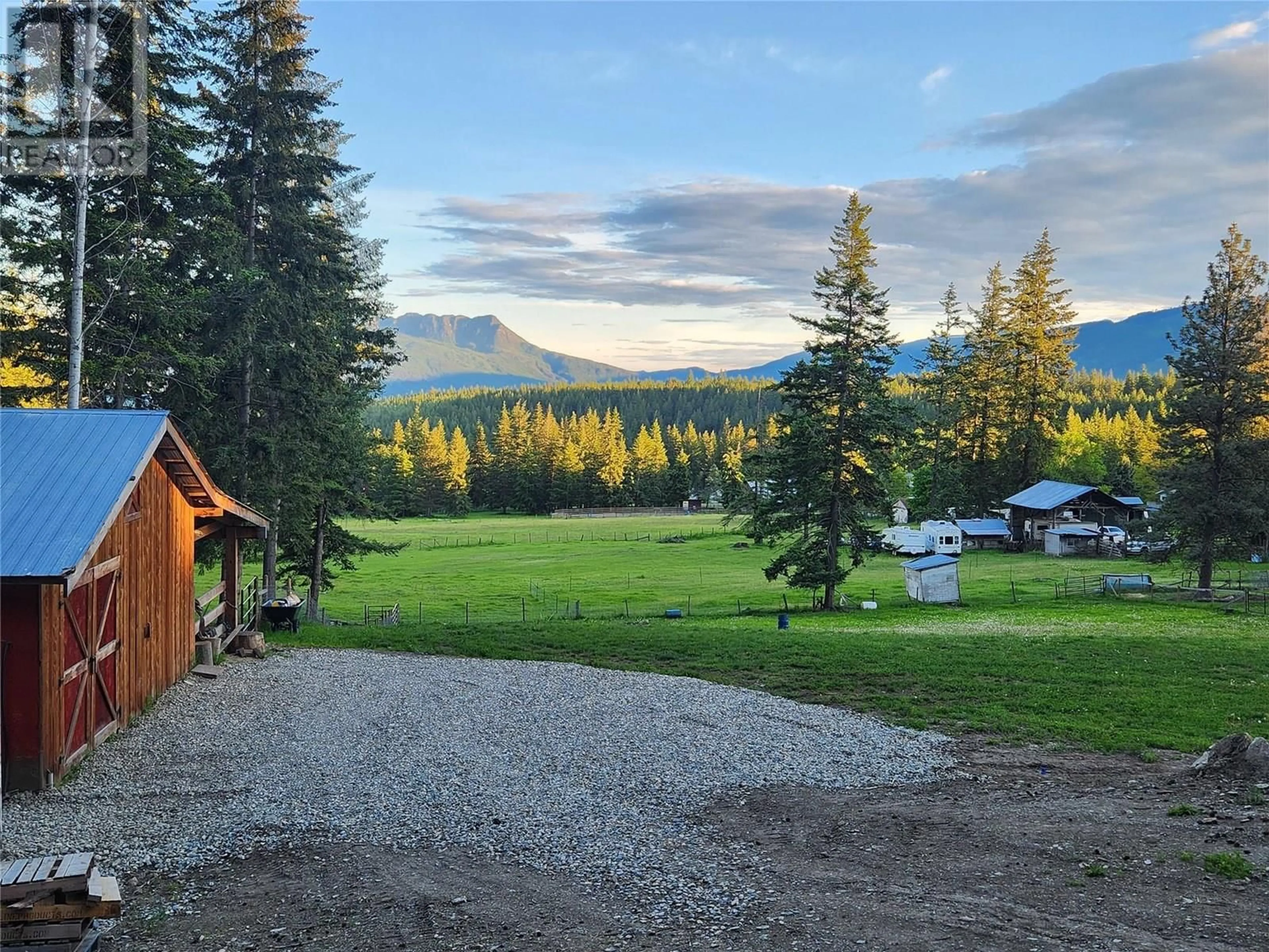 A pic from outside/outdoor area/front of a property/back of a property/a pic from drone, mountain view for 922 MOBLEY ROAD, Tappen British Columbia V0E2X1