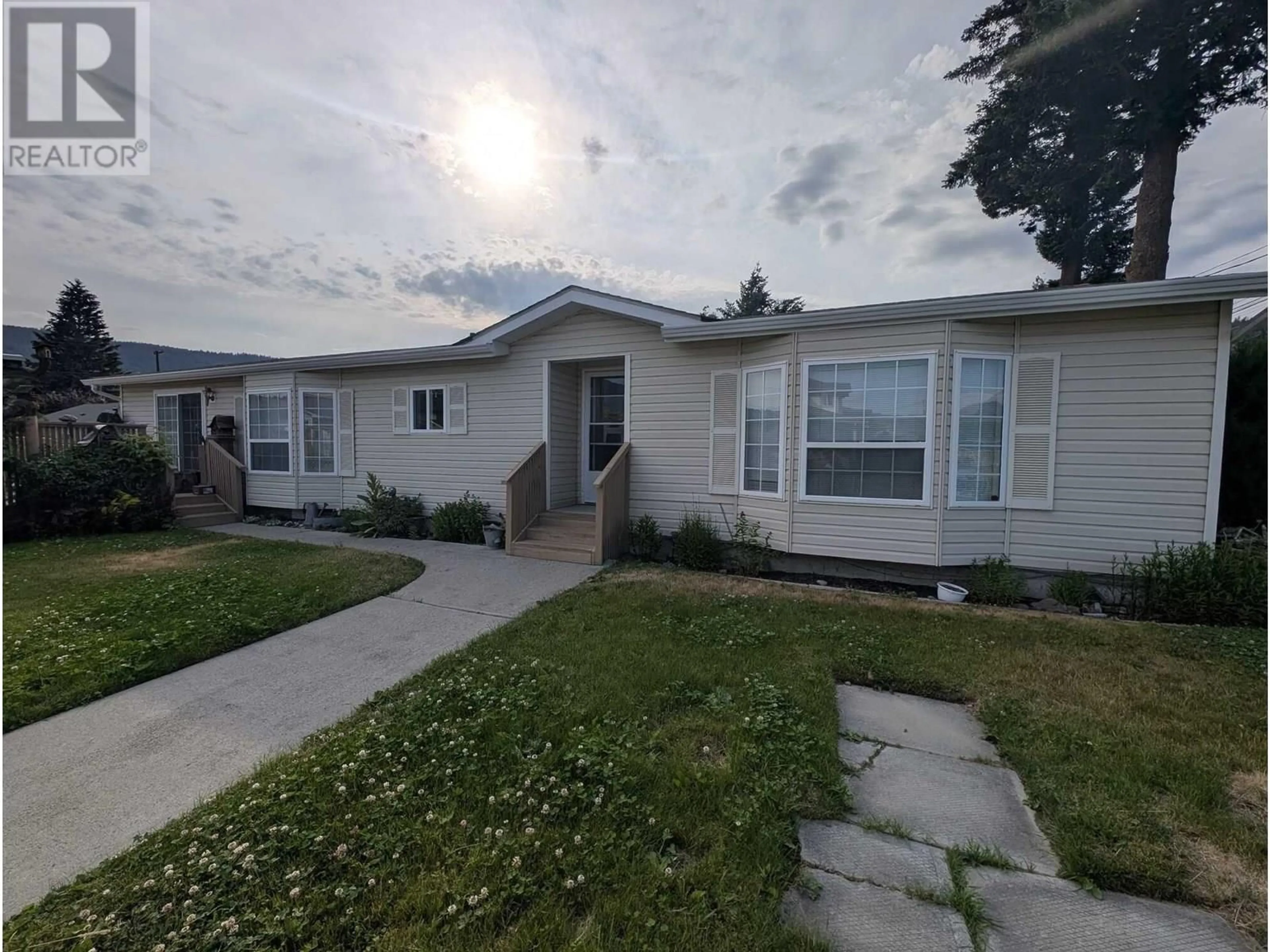 Home with vinyl exterior material, street for 1590 COLDWATER AVENUE, Merritt British Columbia V1K1B8