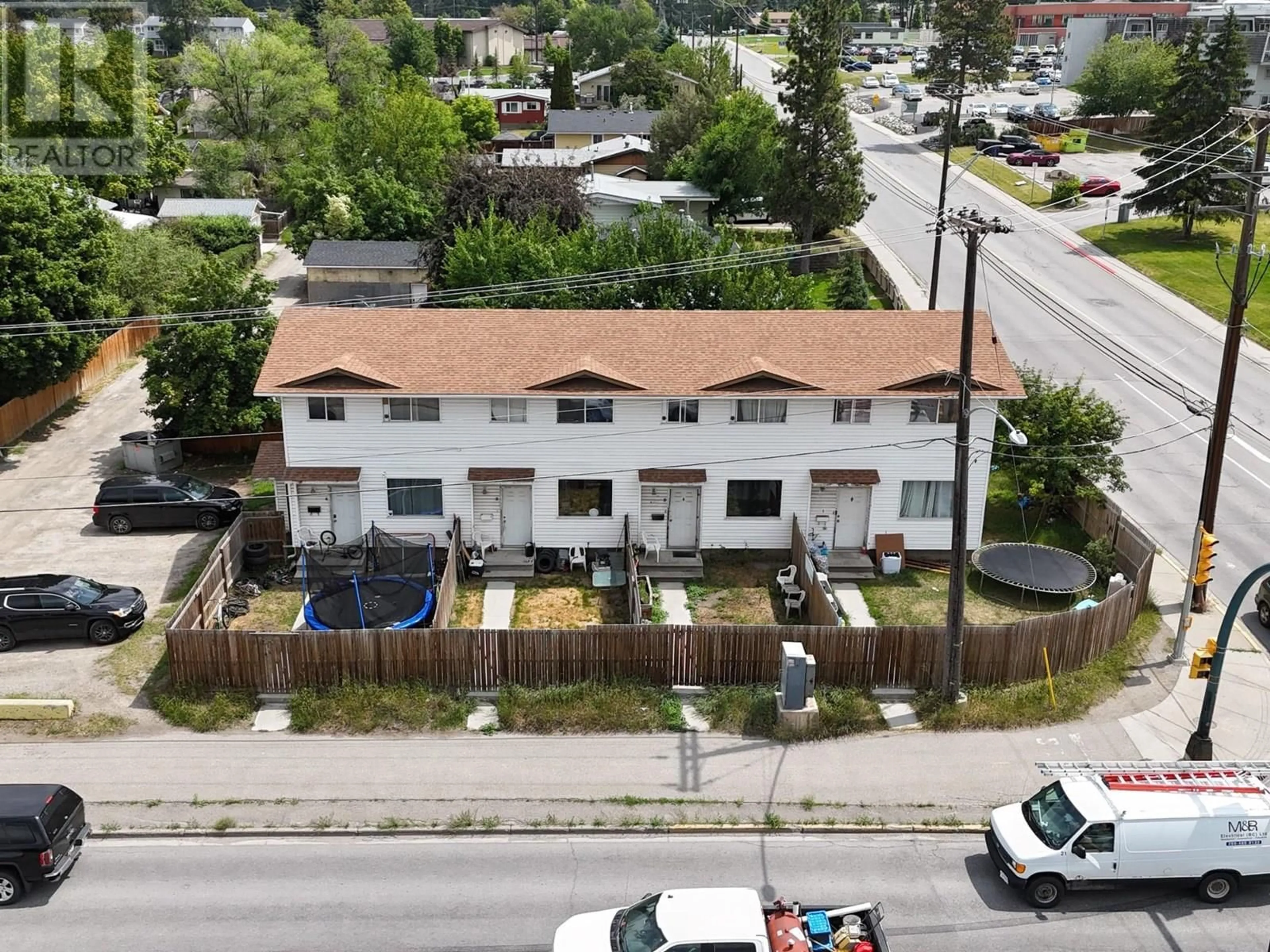 A pic from outside/outdoor area/front of a property/back of a property/a pic from drone, street for 2000 2ND STREET NORTH, Cranbrook British Columbia V1C4M5