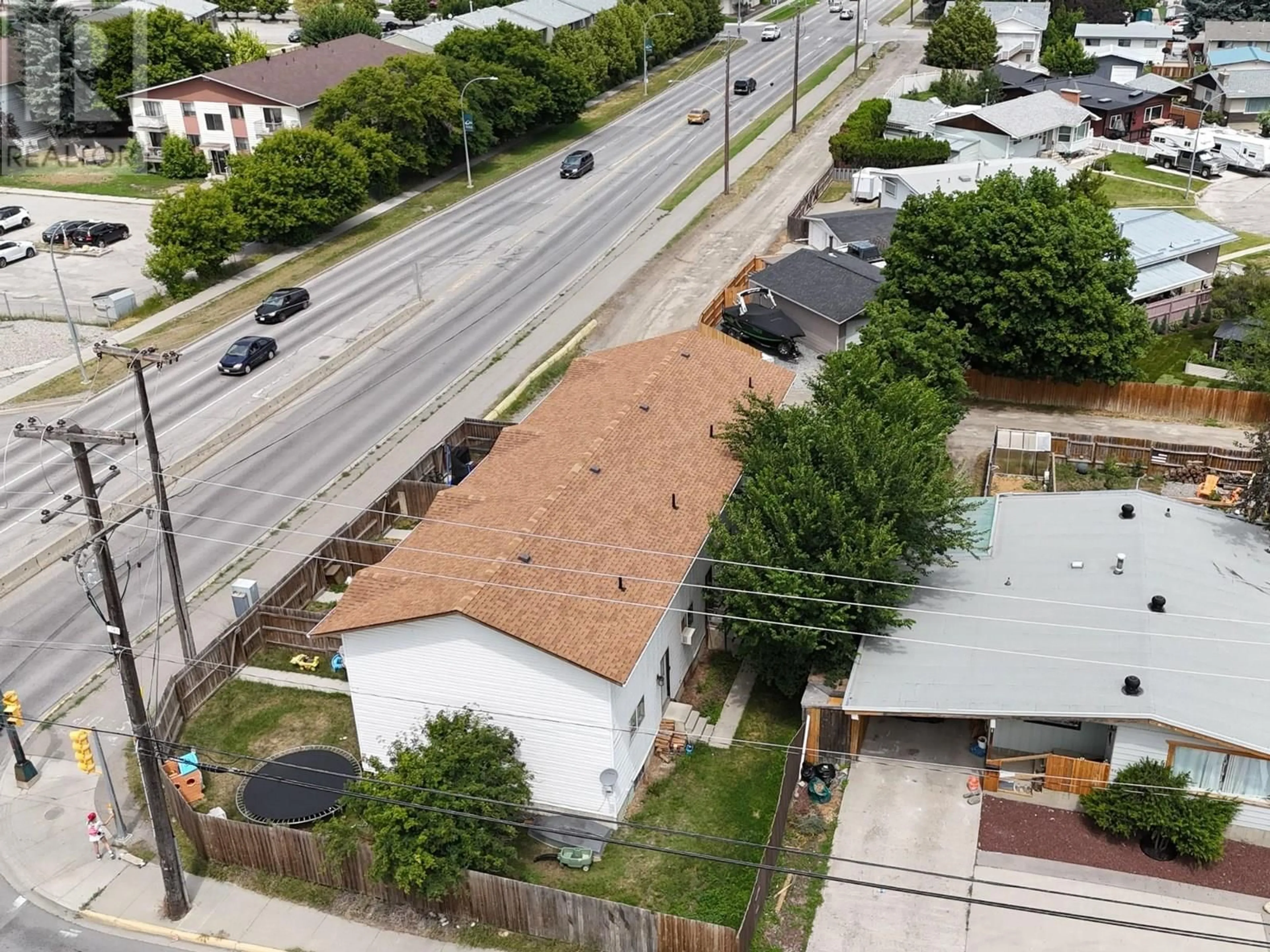 A pic from outside/outdoor area/front of a property/back of a property/a pic from drone, street for 2000 2ND STREET NORTH, Cranbrook British Columbia V1C4M5