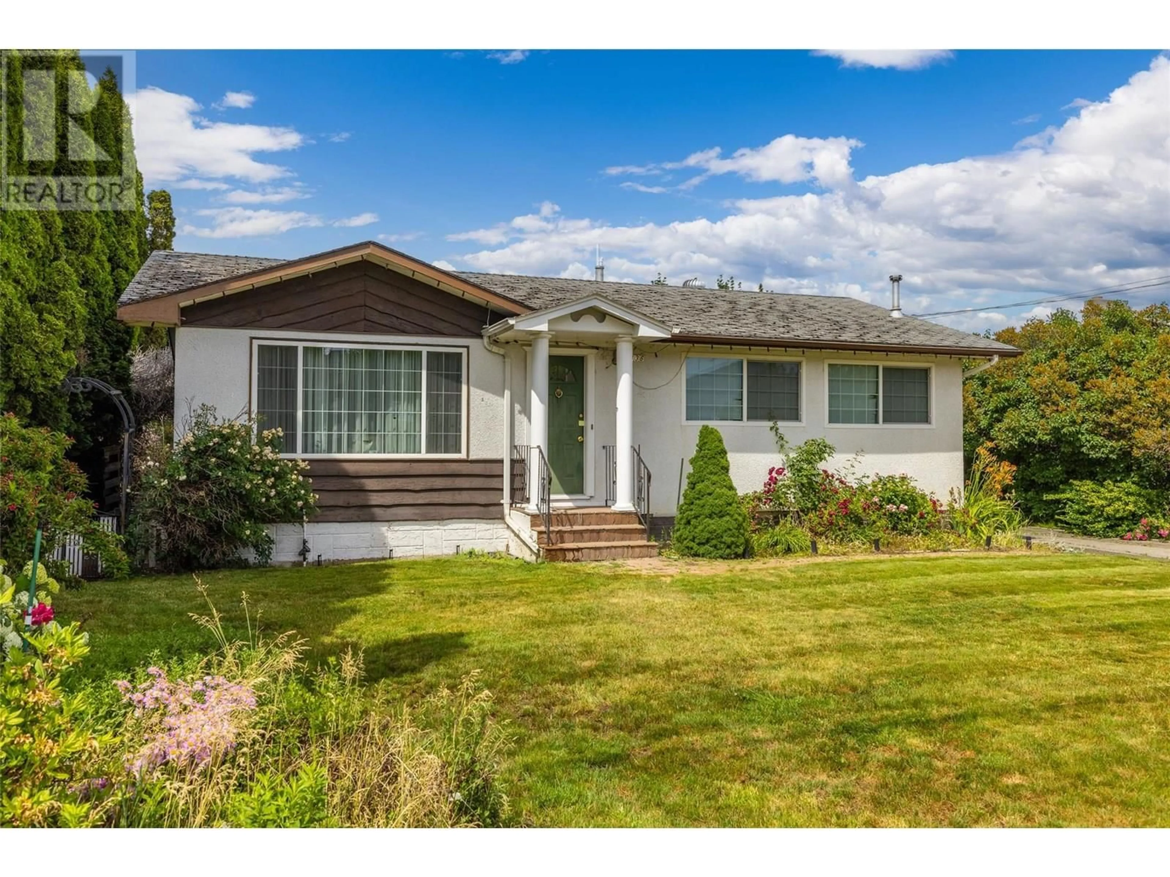 Home with vinyl exterior material, street for 2436 APOLLO ROAD, West Kelowna British Columbia V4T1P7