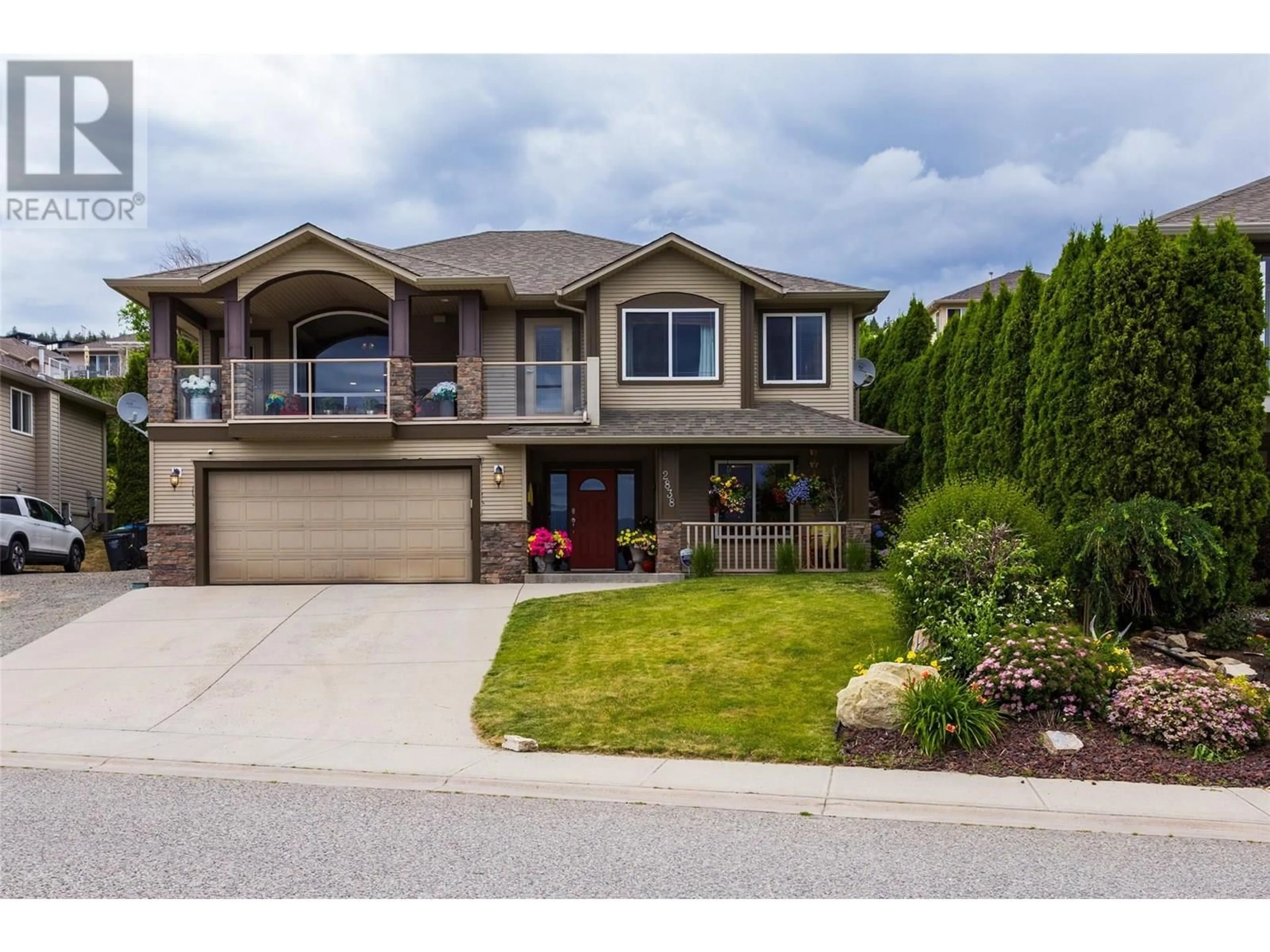 Home with vinyl exterior material, street for 2838 SALISH ROAD, West Kelowna British Columbia V4T2V9